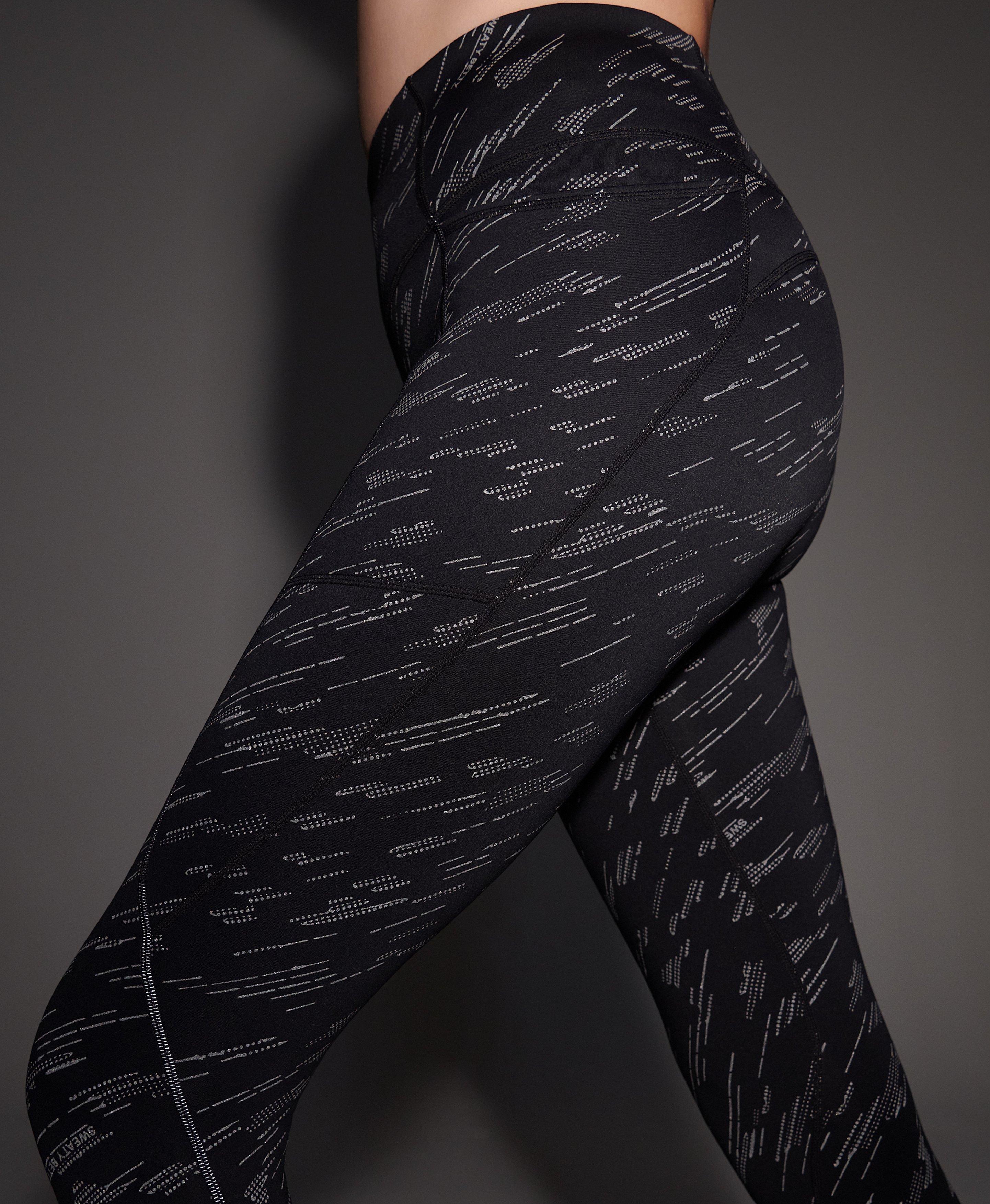 Therma Boost 7 8 Running Leggings Black Camo Reflective Print Women s Leggings Sweaty Betty