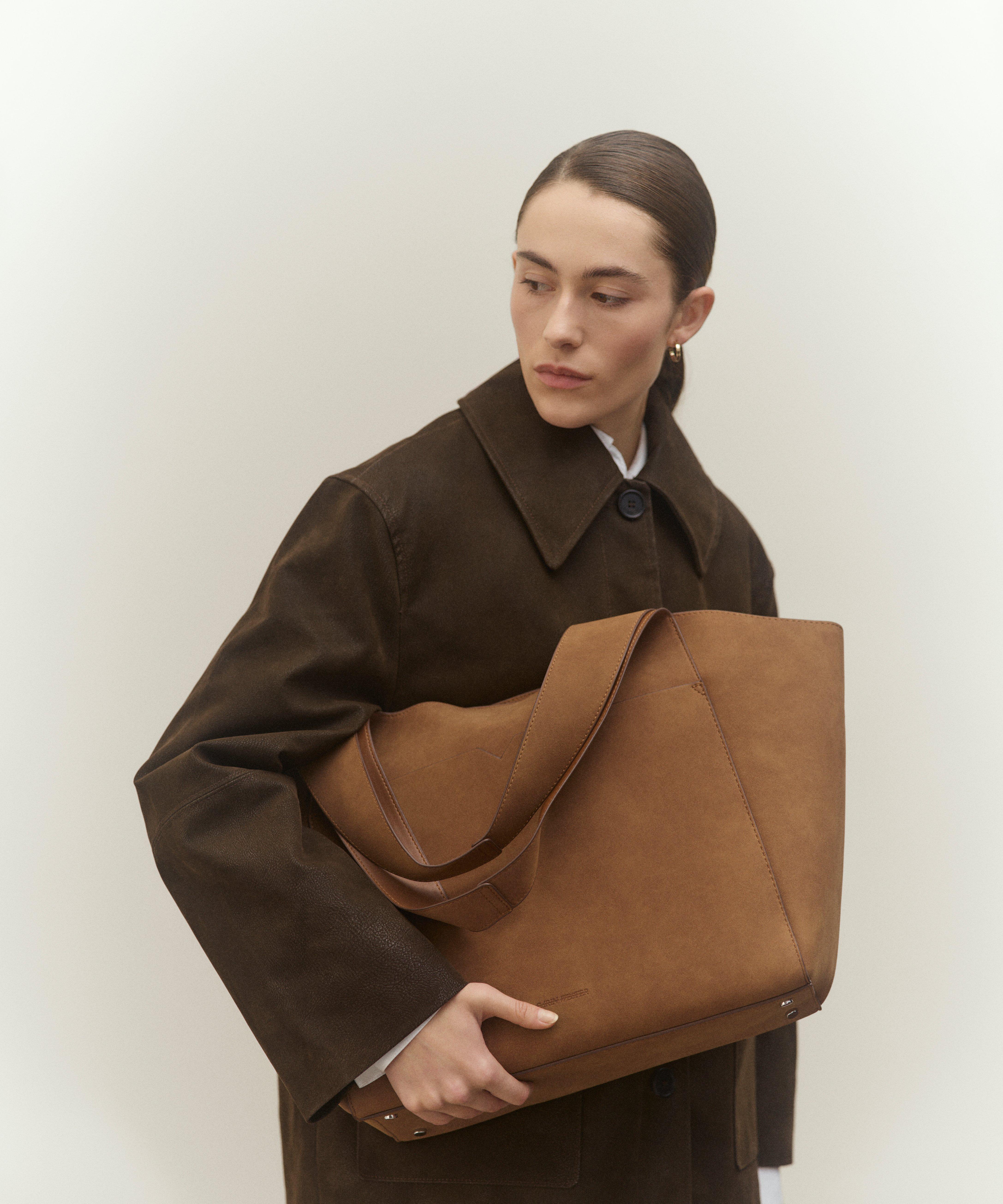 Väskor och plånböcker för dam.