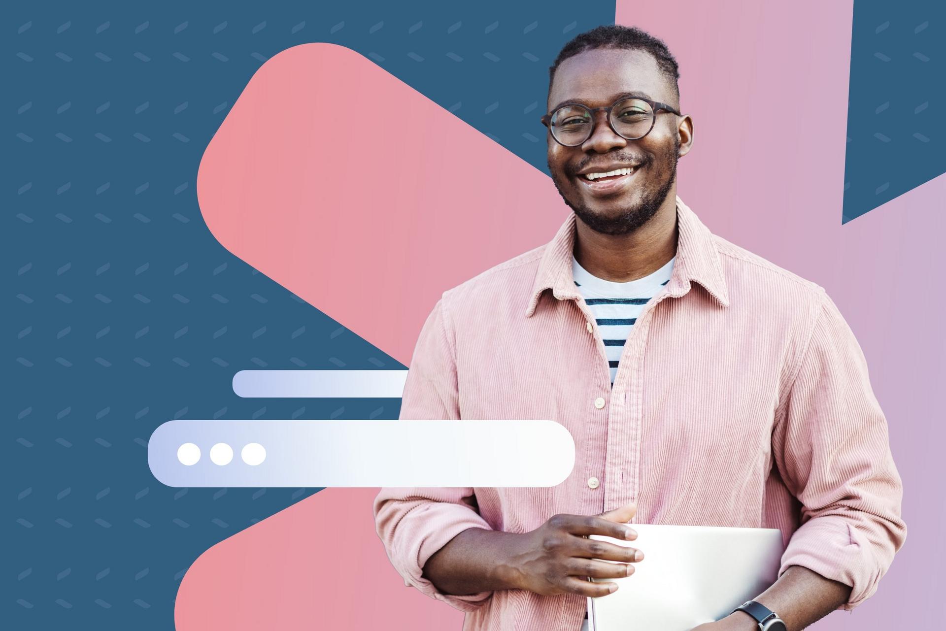Smiling person in a pink shirt holding a laptop against a colorful abstract background.