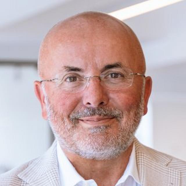 Headshot of Amplience CEO Anthony Lye, half smiling