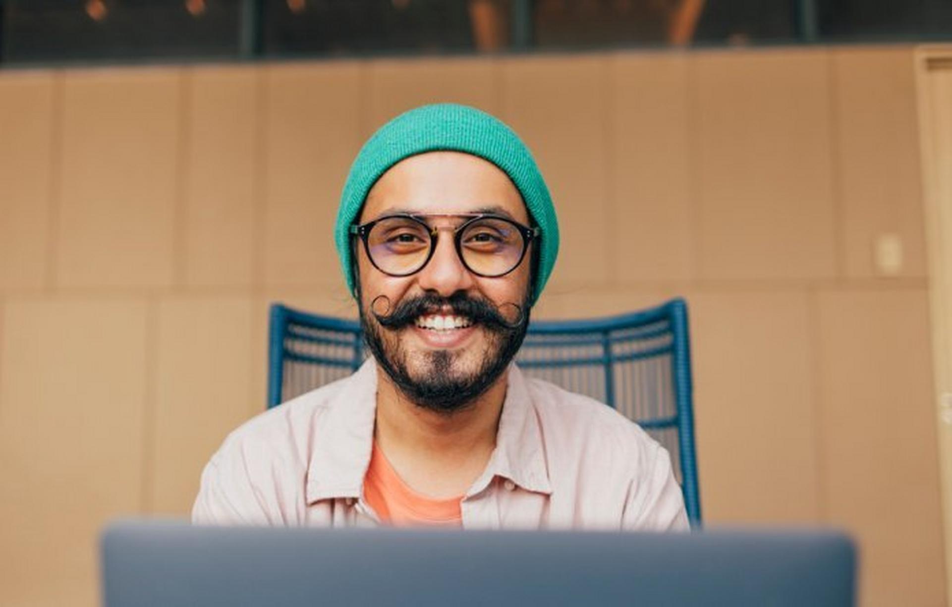 Happy person with hat and fun moustache