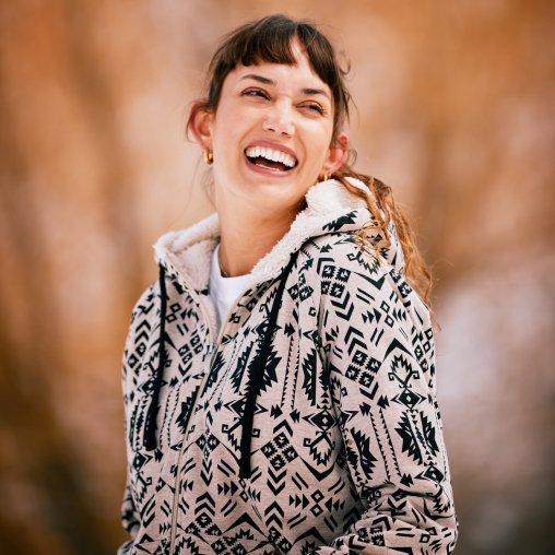 woman laughing in ariat jacket