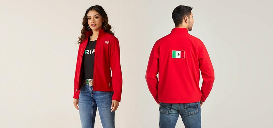 Man and woman standing in red ariat mexico softshell jackets