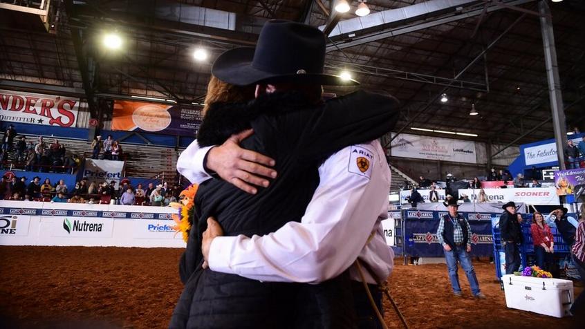 Kendra hugging her son, Taylor Santos after winning the Timed Event Championship in 2020