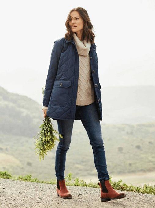 woman walking in ariat countryside jacket and shoes