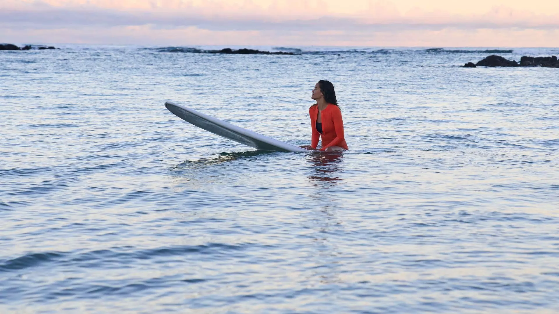 Woman on a surfboard