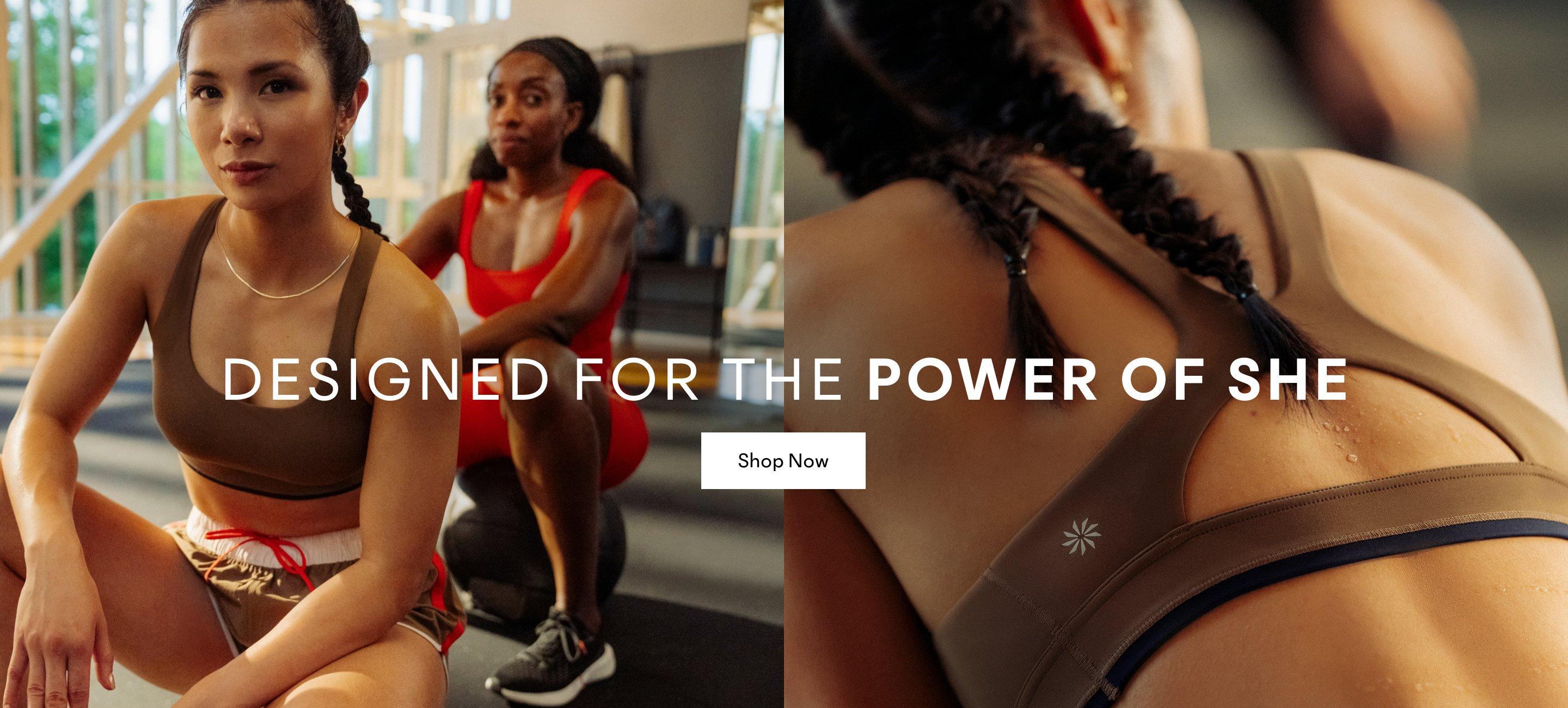 two women in sports bras and leggings posing for a photo. Designed for the Power of She. Shop Now