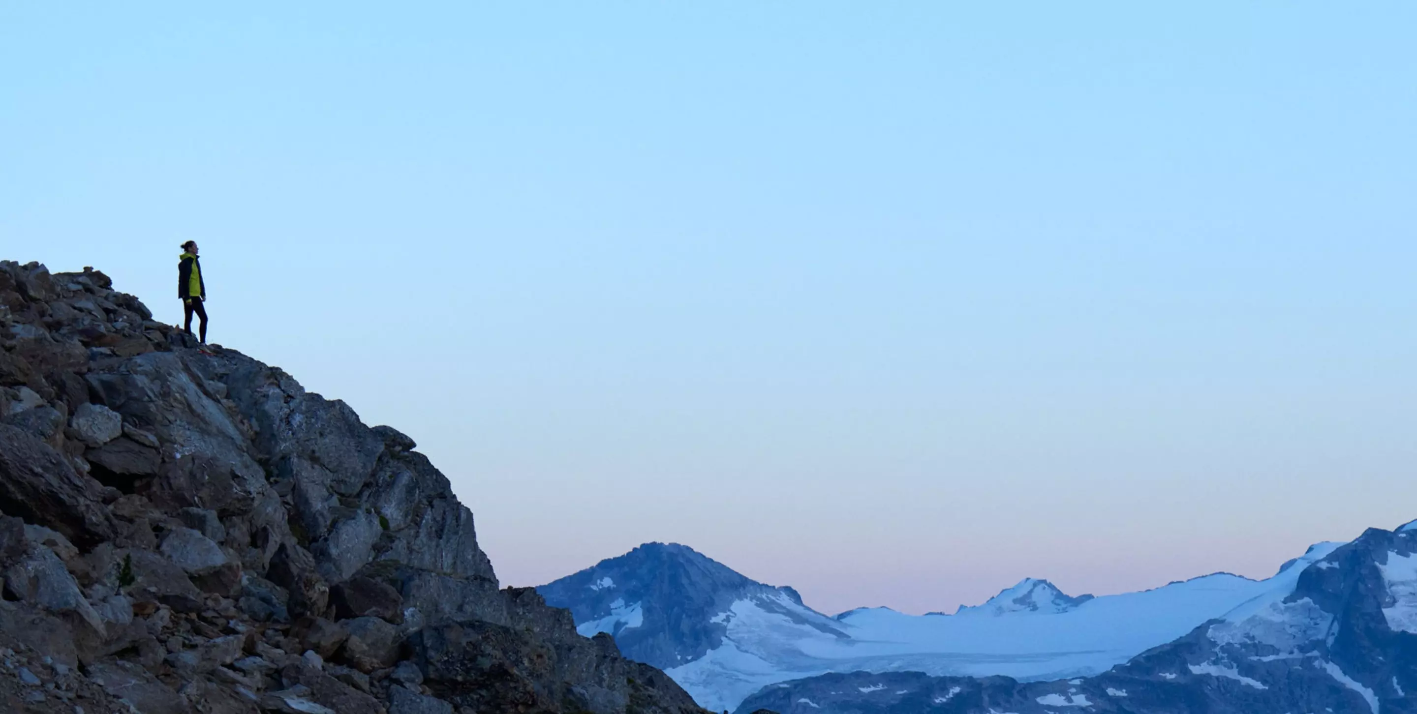 Woman climbing a mountain