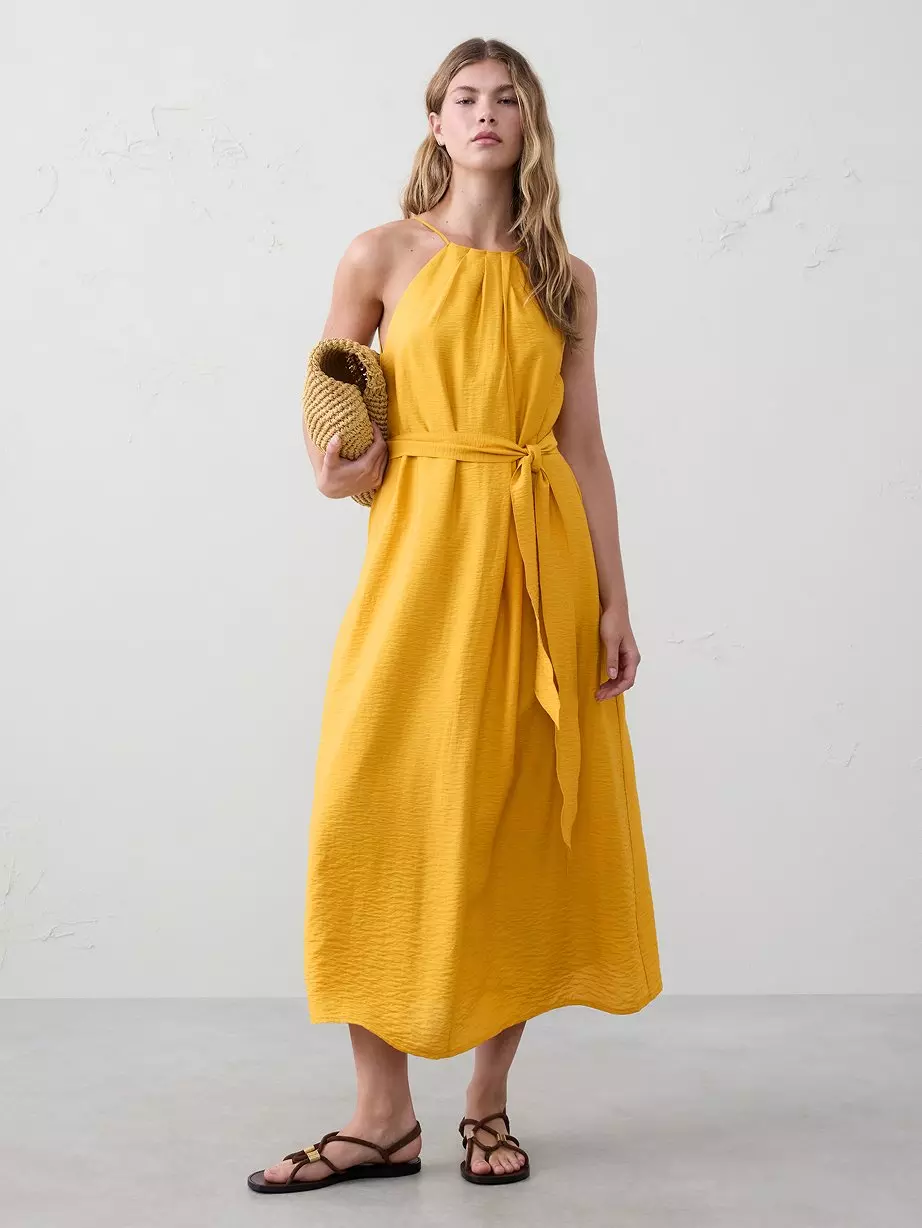 Woman in yellow dress.