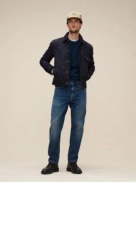 Athletic. A relaxed fit with more room in the seat and thigh