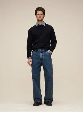 Loose. Relaxed through the thigh, straight through the leg