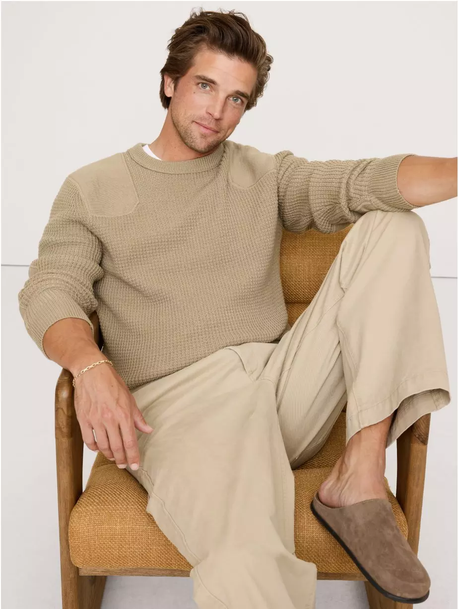 Man in tan sweater & pants