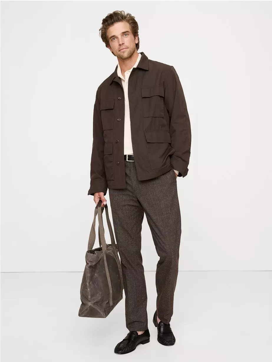 Man in brown pants & jacket