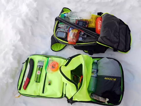 backpack or tunnel bag proper snowmobile gear