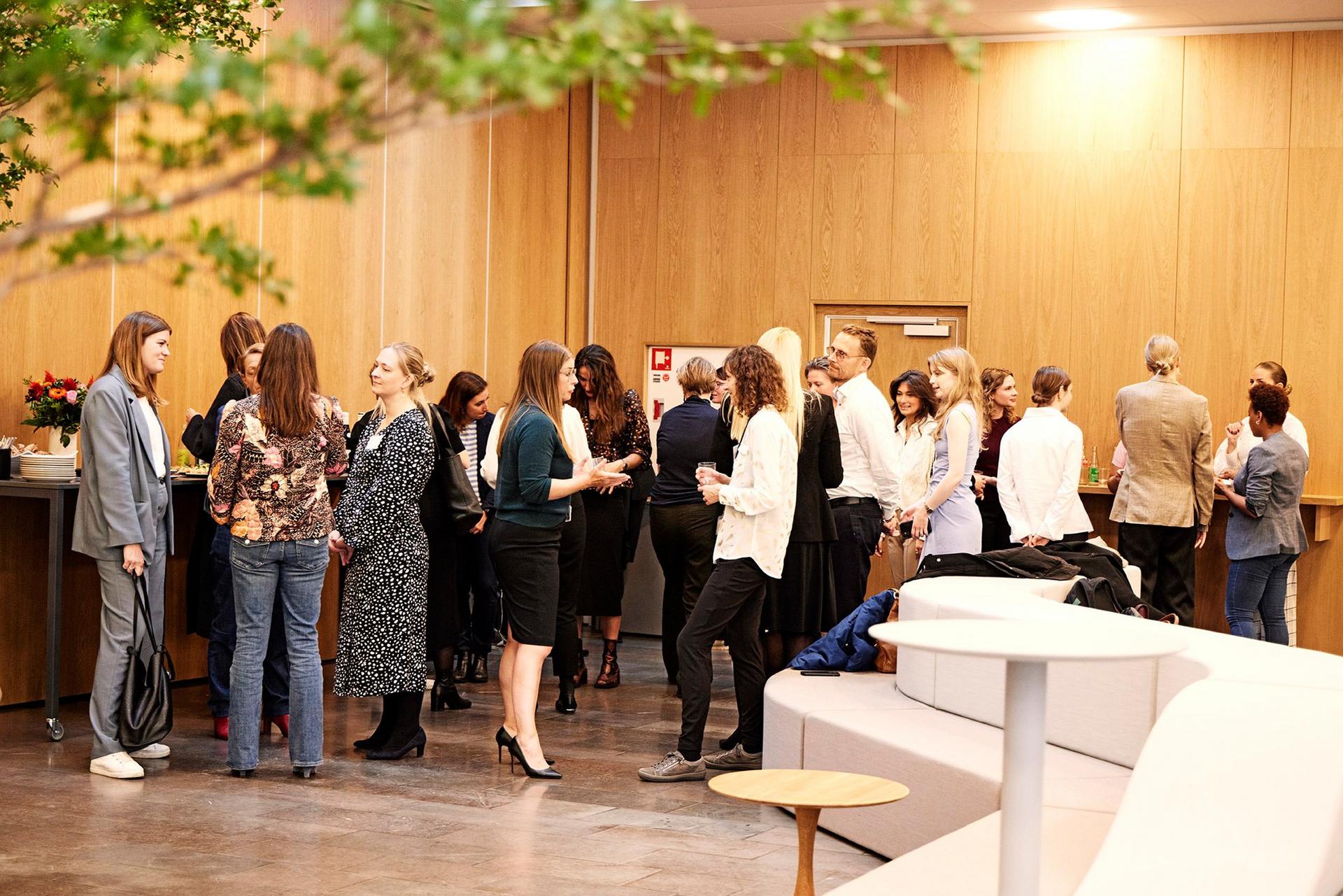 Women chatting at networking at a conference setting