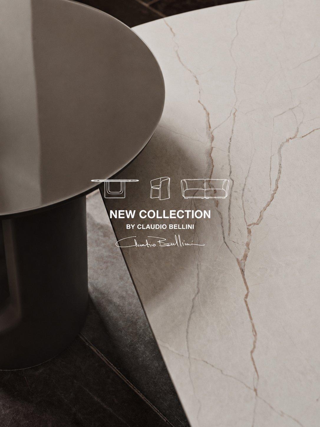 大理石調の天板と丸テーブルのクローズアップ、「NEW COLLECTION BY CLAUDIO BELLINI」の文字入り。