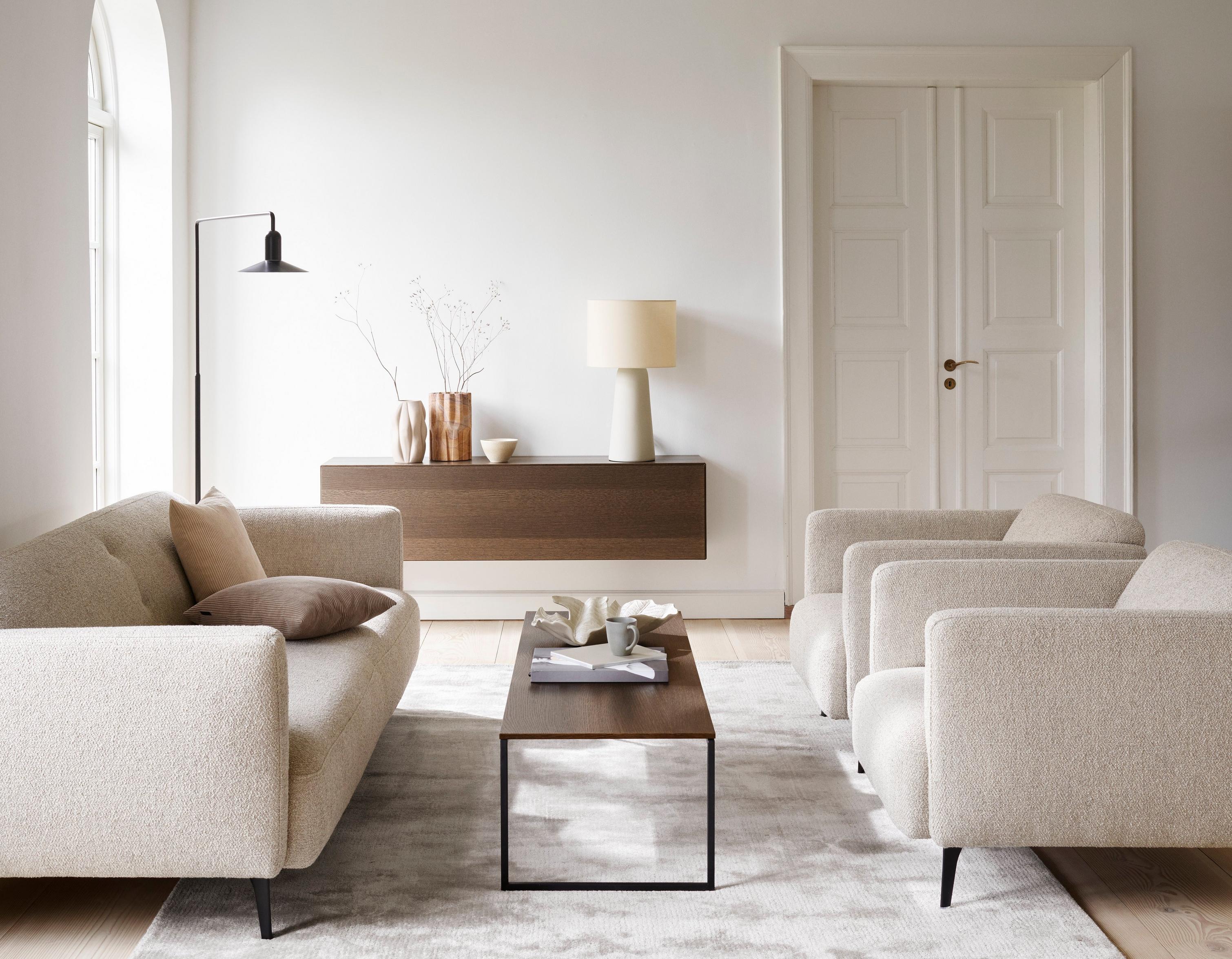 The Modena 3-seater in beige Lazio with the Modena chair and the Lugo coffee table.