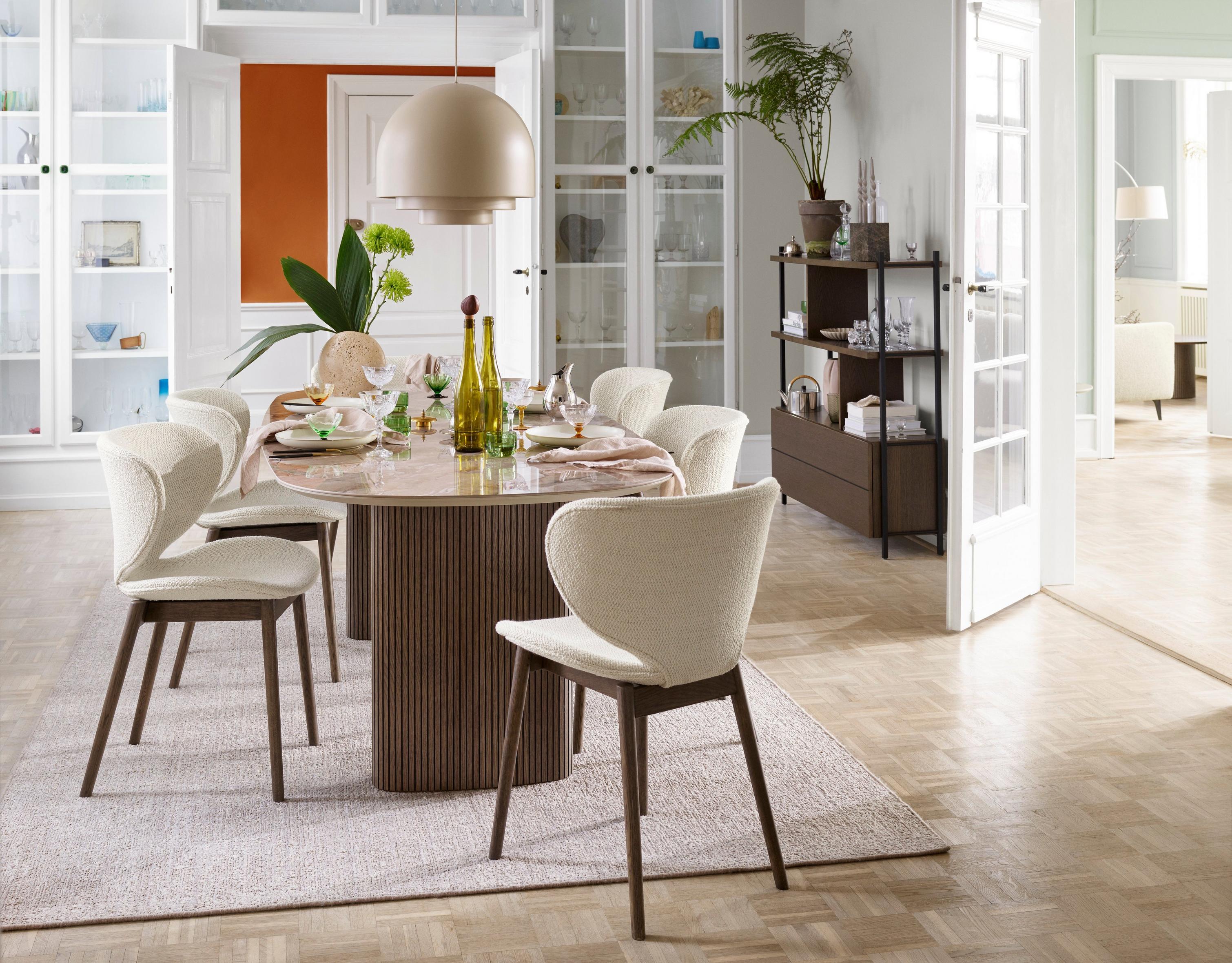 Scandinavian-style dining room with the Santiago dining table in brown ceramic