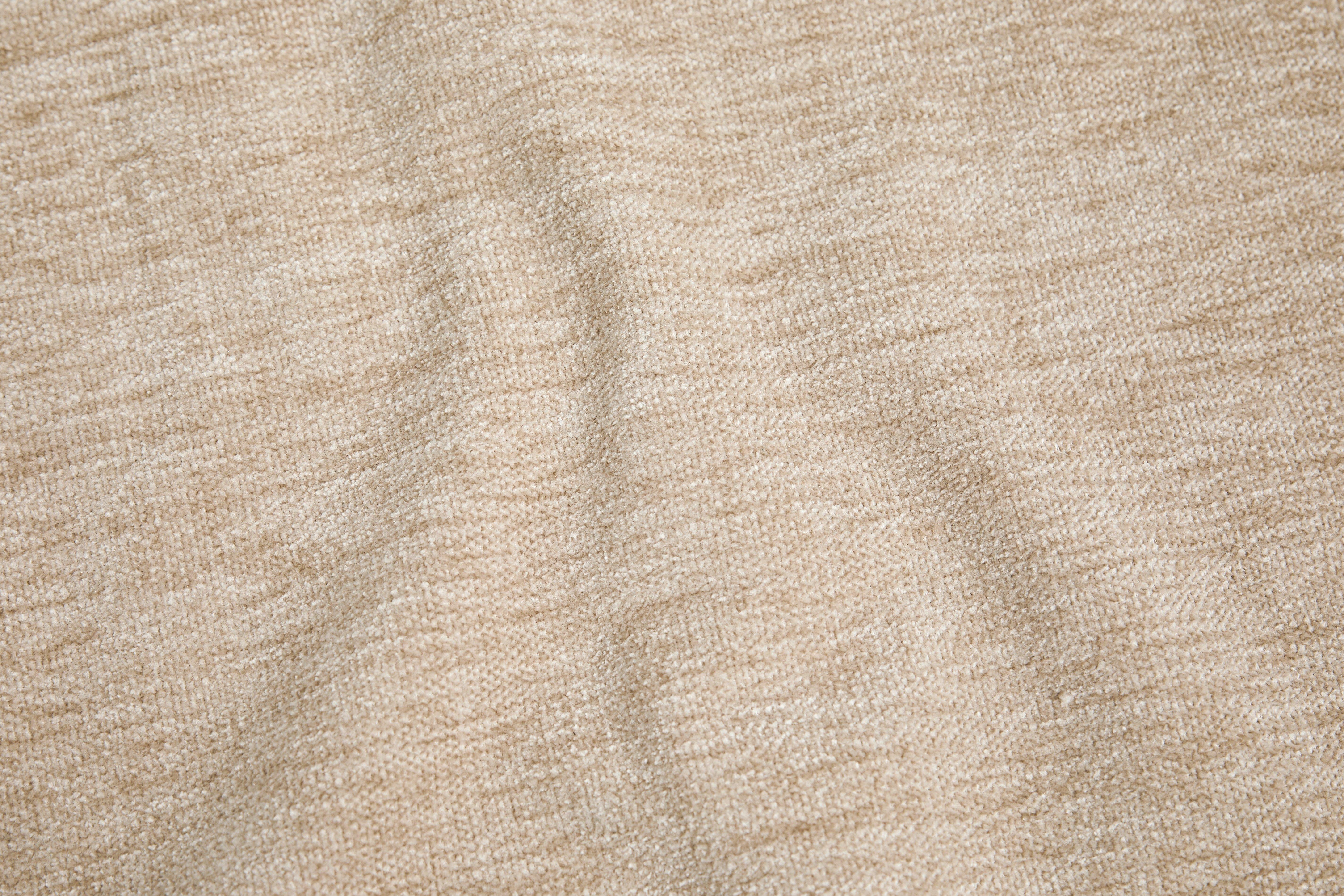 Materiaali-värinäyte Tomelilla, beige