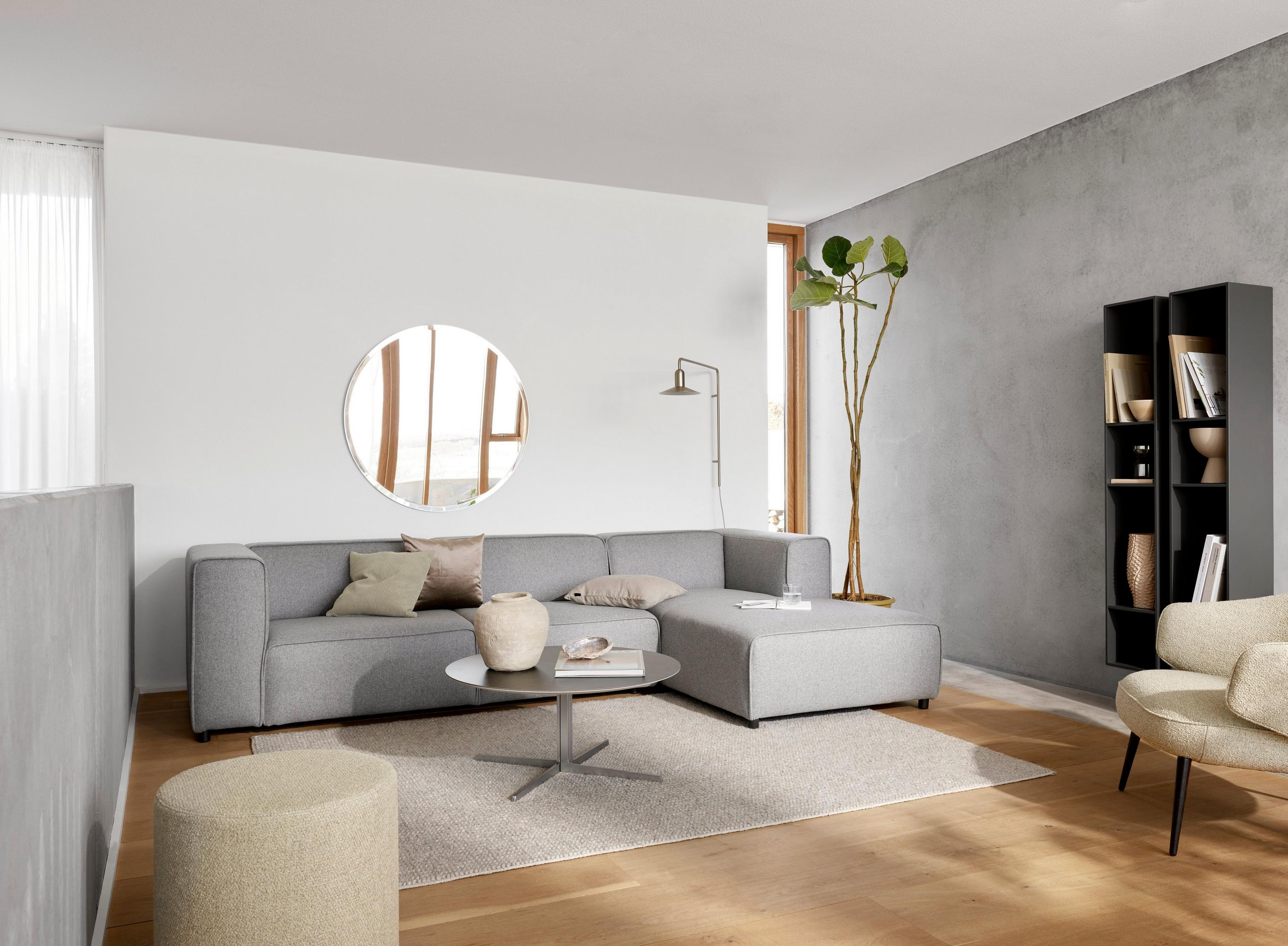 Sofa narożna Carmo z modułem wypoczynkowym tapicerowana szarą tkaniną Tomelilla i stolik kawowy Sevilla
