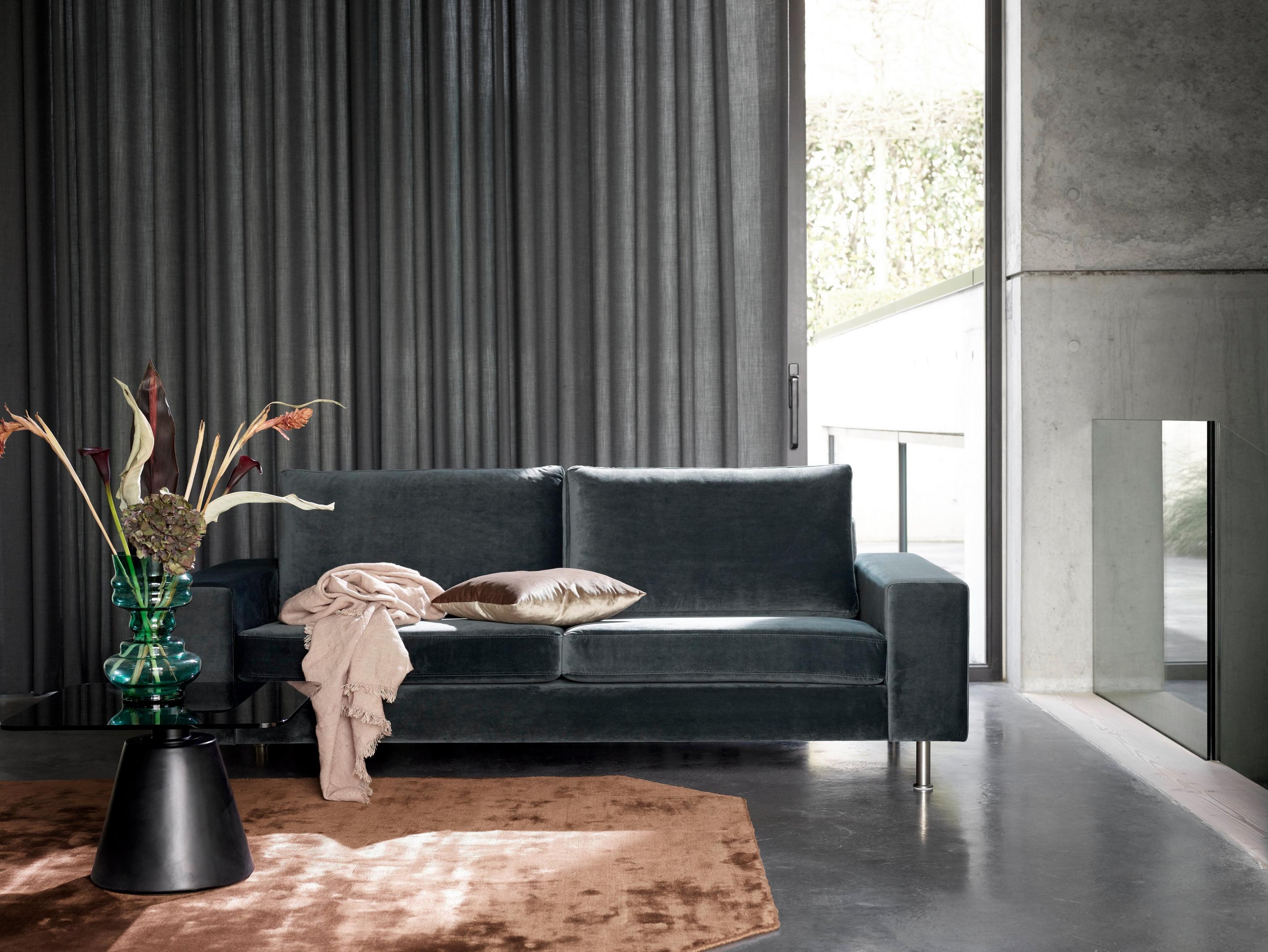 The Indivi sofa in a dusty green velvet with the Madrid coffee table.