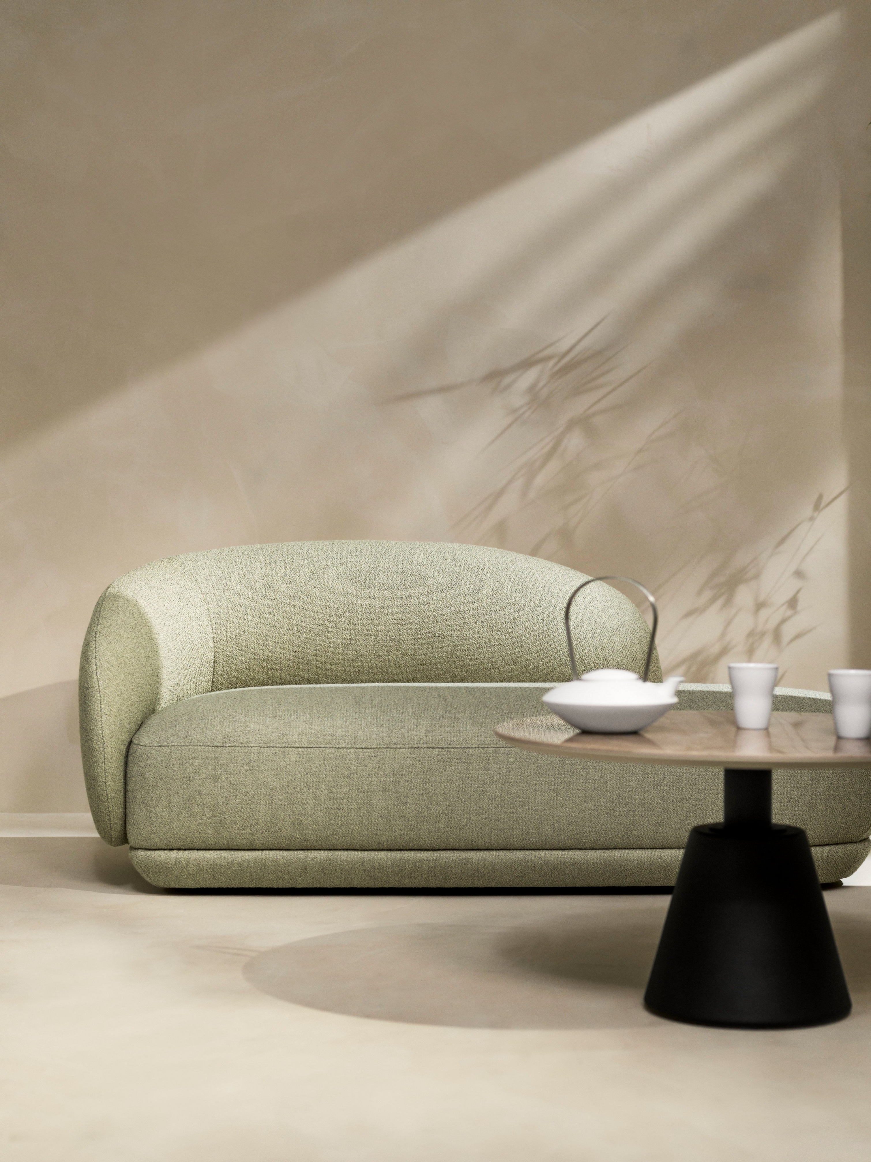 Peaceful living space with the Bolzano chaise longue in light green Lazio fabric