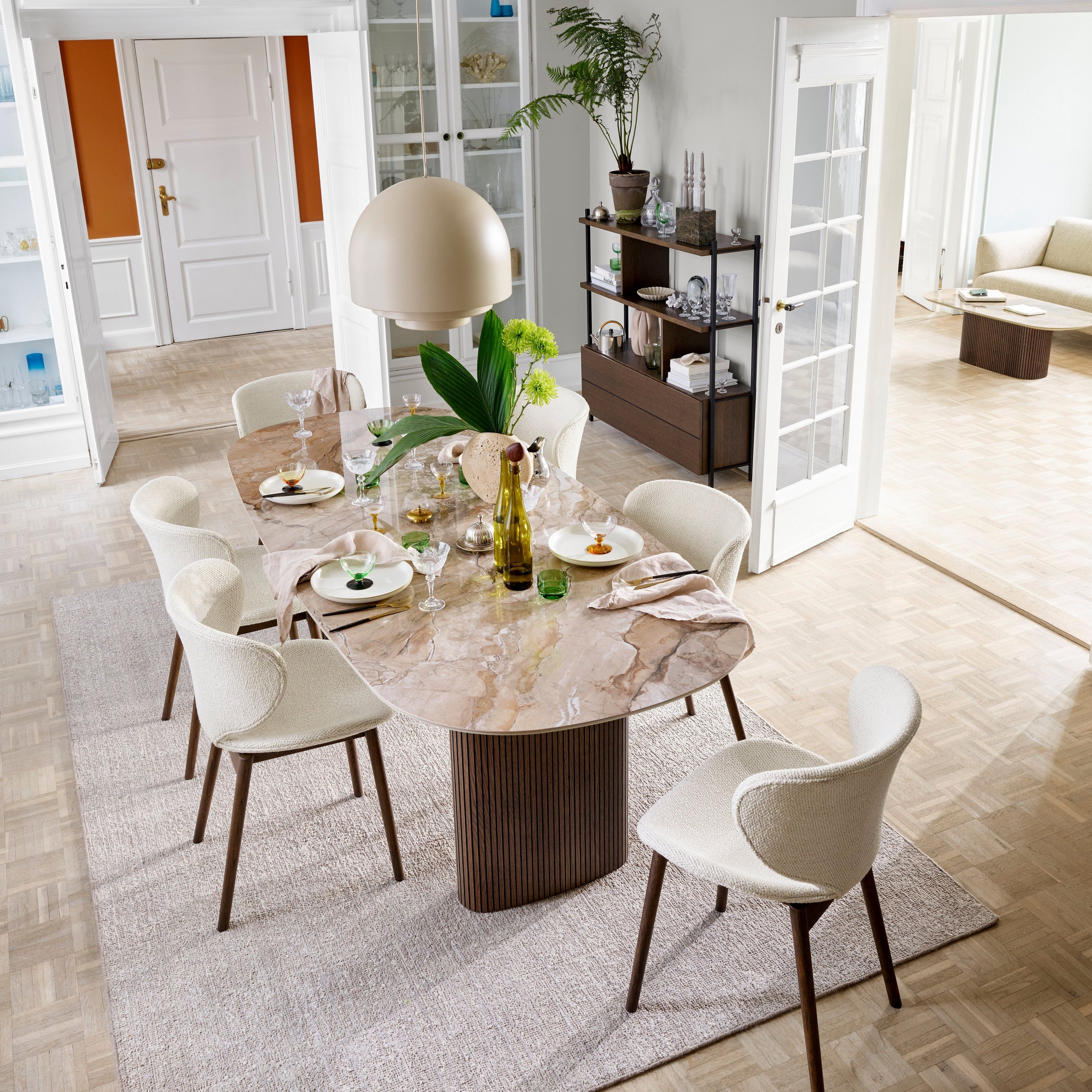 Contemporary neutral dining room featuring the Santiago dining table.