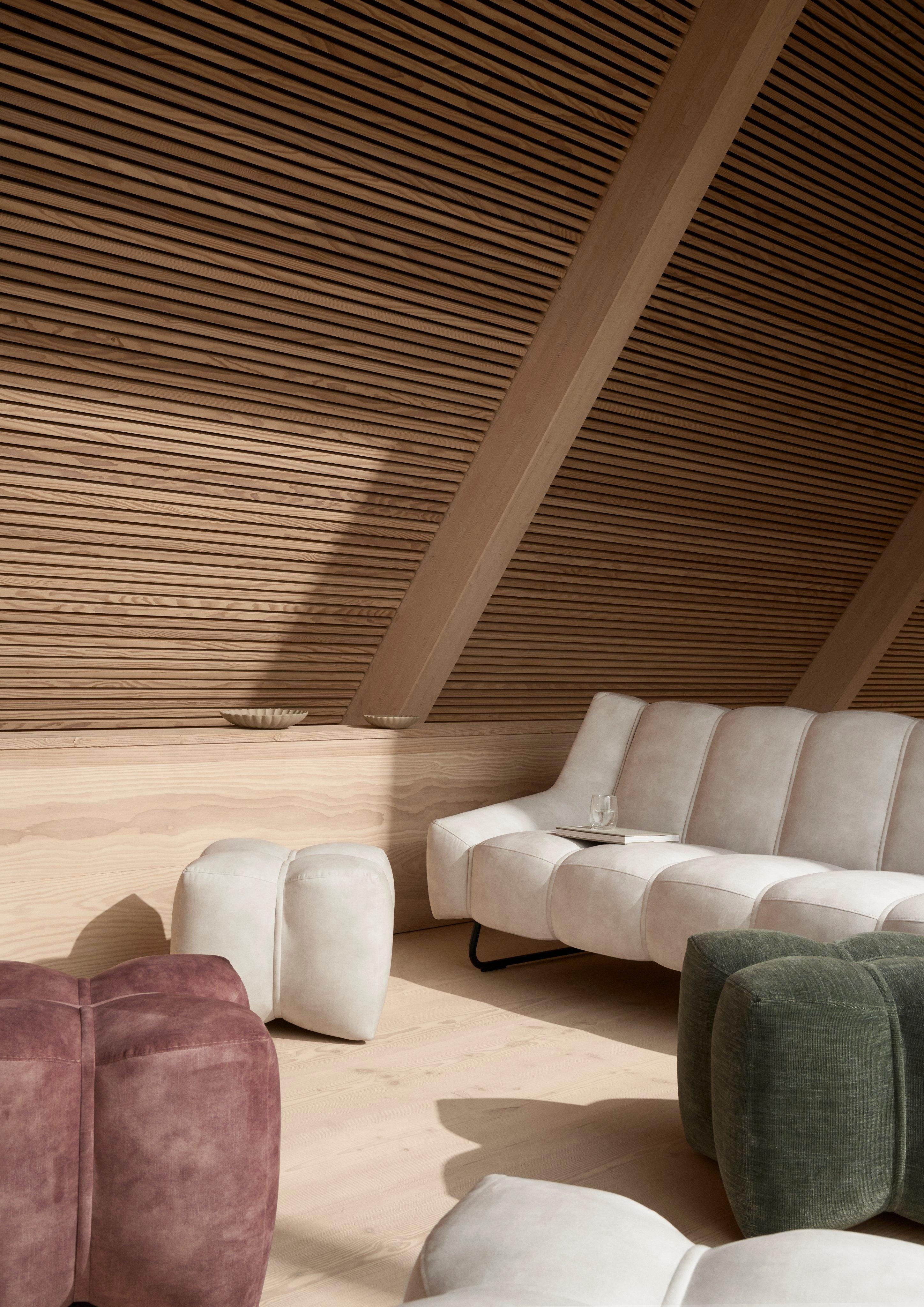 A neutral A-frame living room with the Nawabari 3 seater sofa upholstered in beige Ravello fabric.