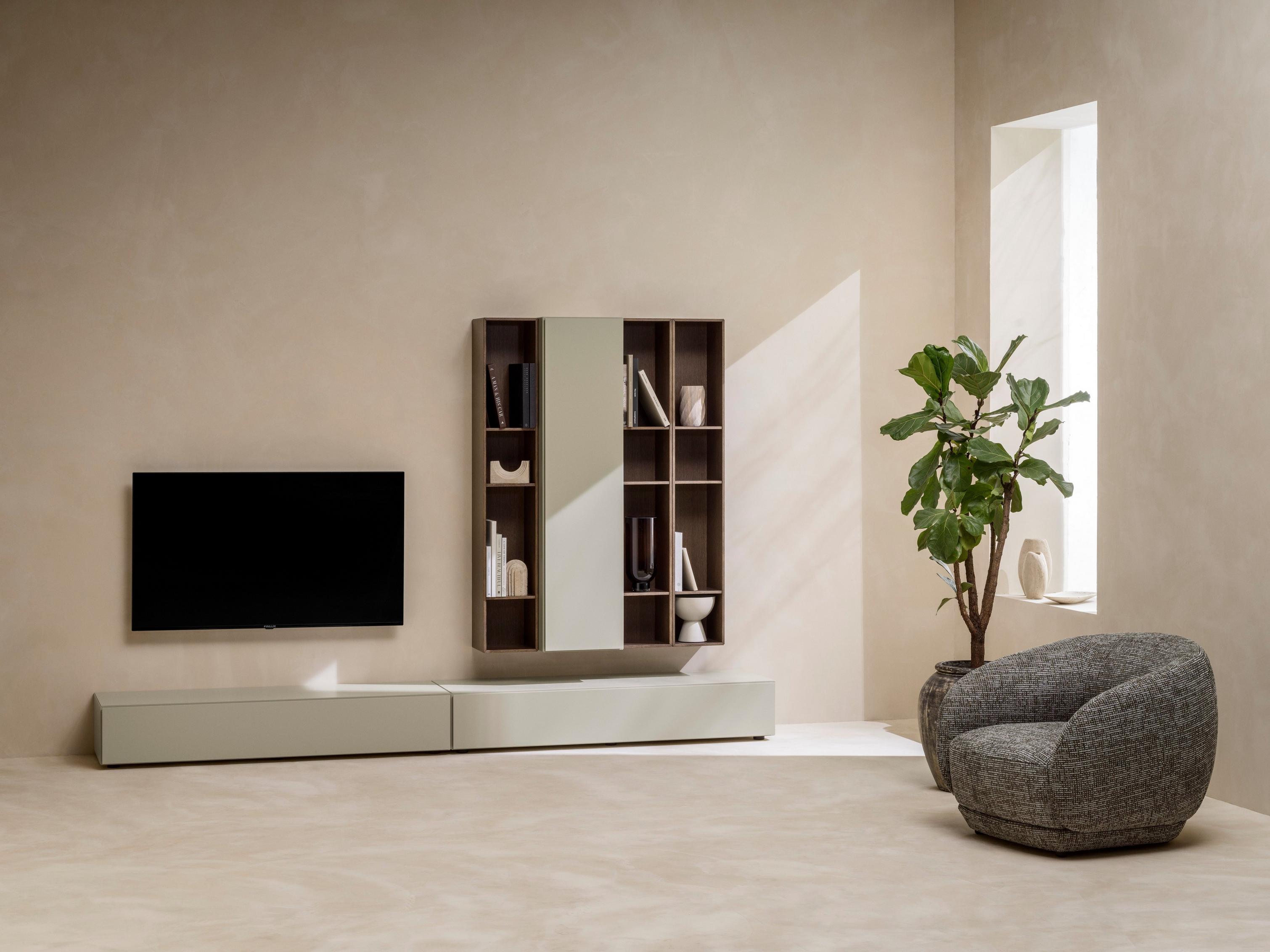Serene living room featuring the Bolzano swivel armchair and Lugano storage.