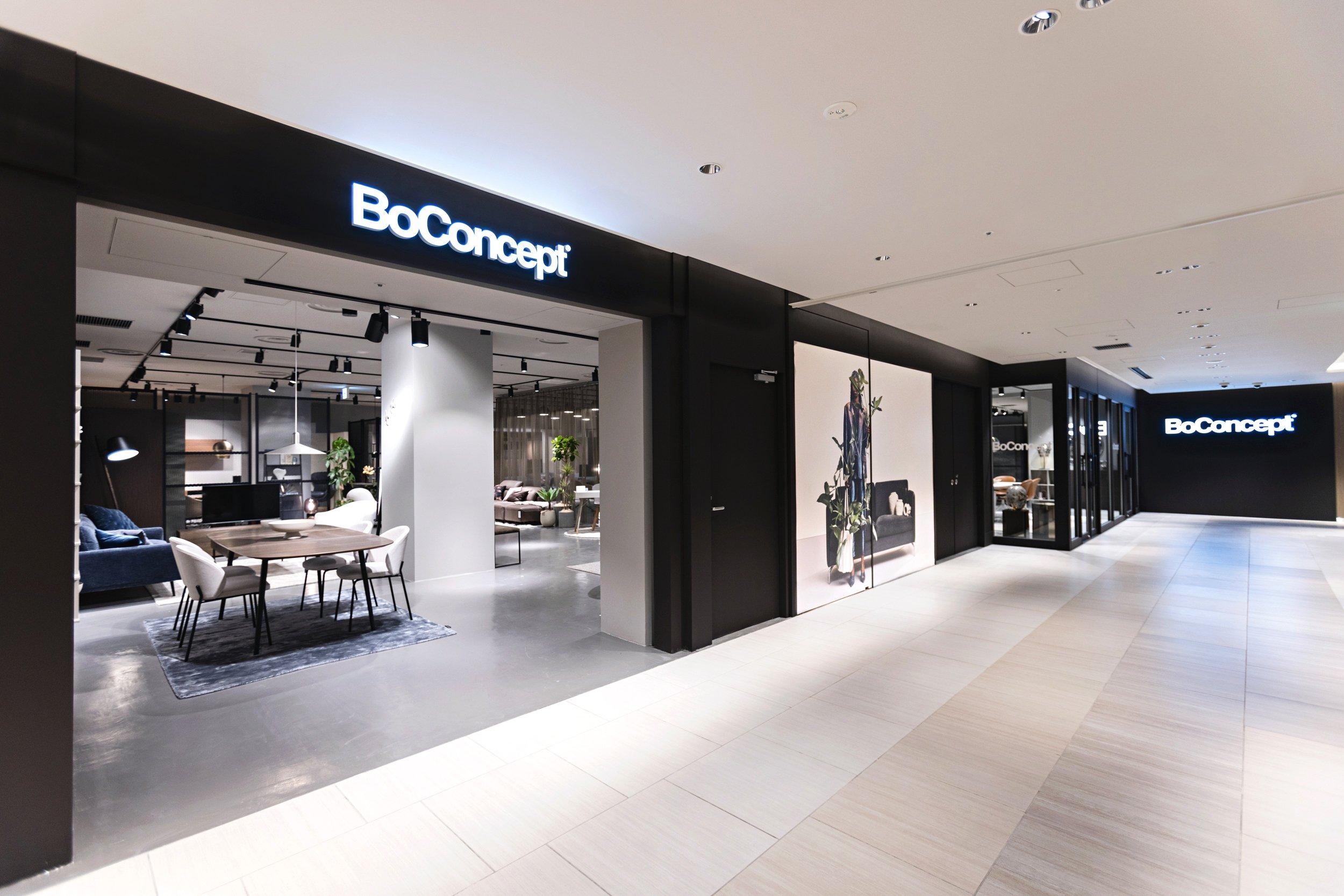 BoConceptの店舗入口と店内のダイニングセット展示。