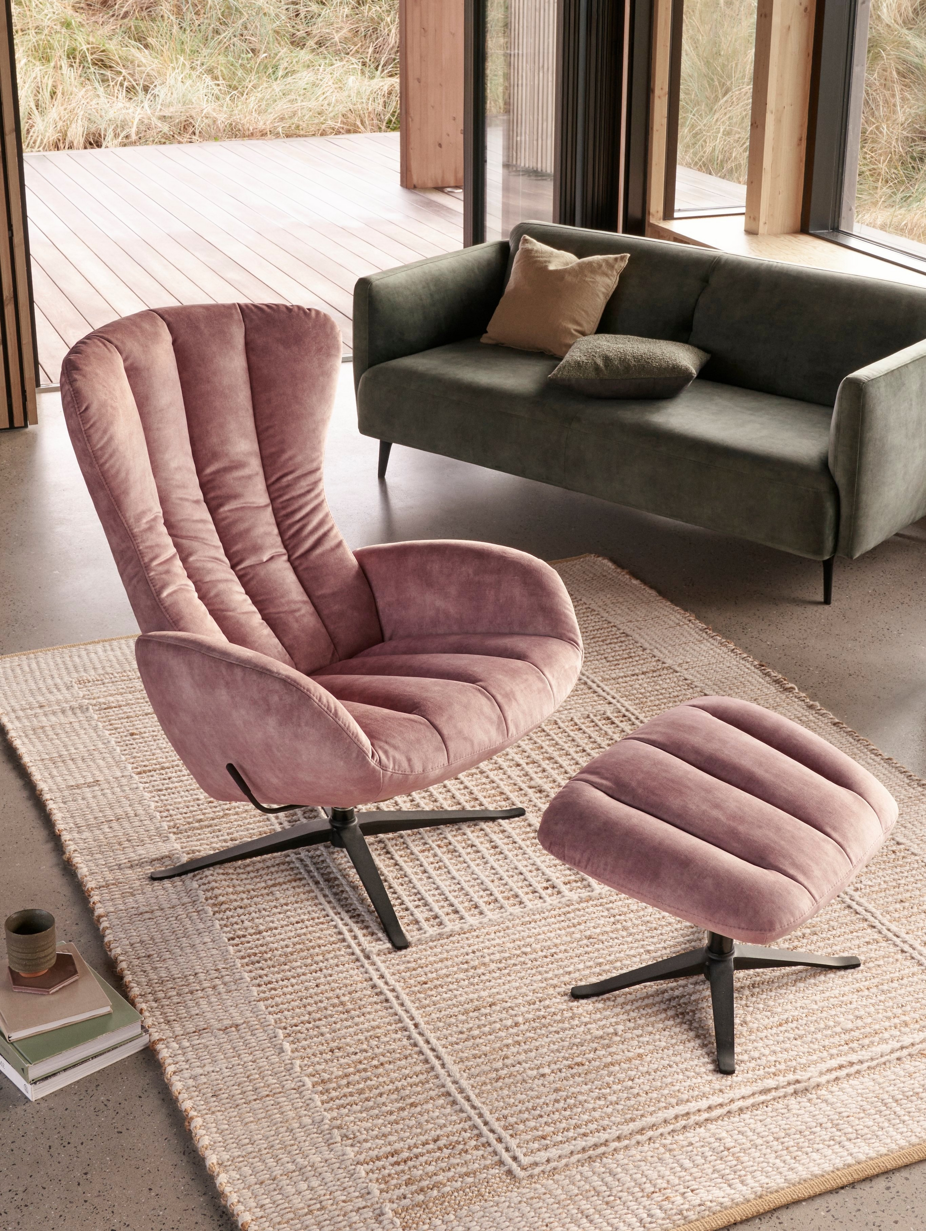 Light-filled living space featuring the Tilburg living chair and matching foot stool in dusty rose Ravello fabric.