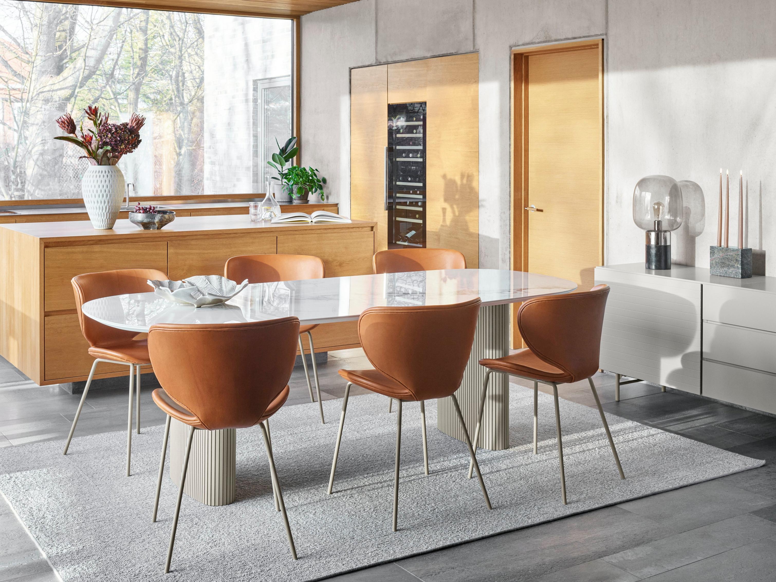 Warm, inviting dining room featuring the Santiago dining table
