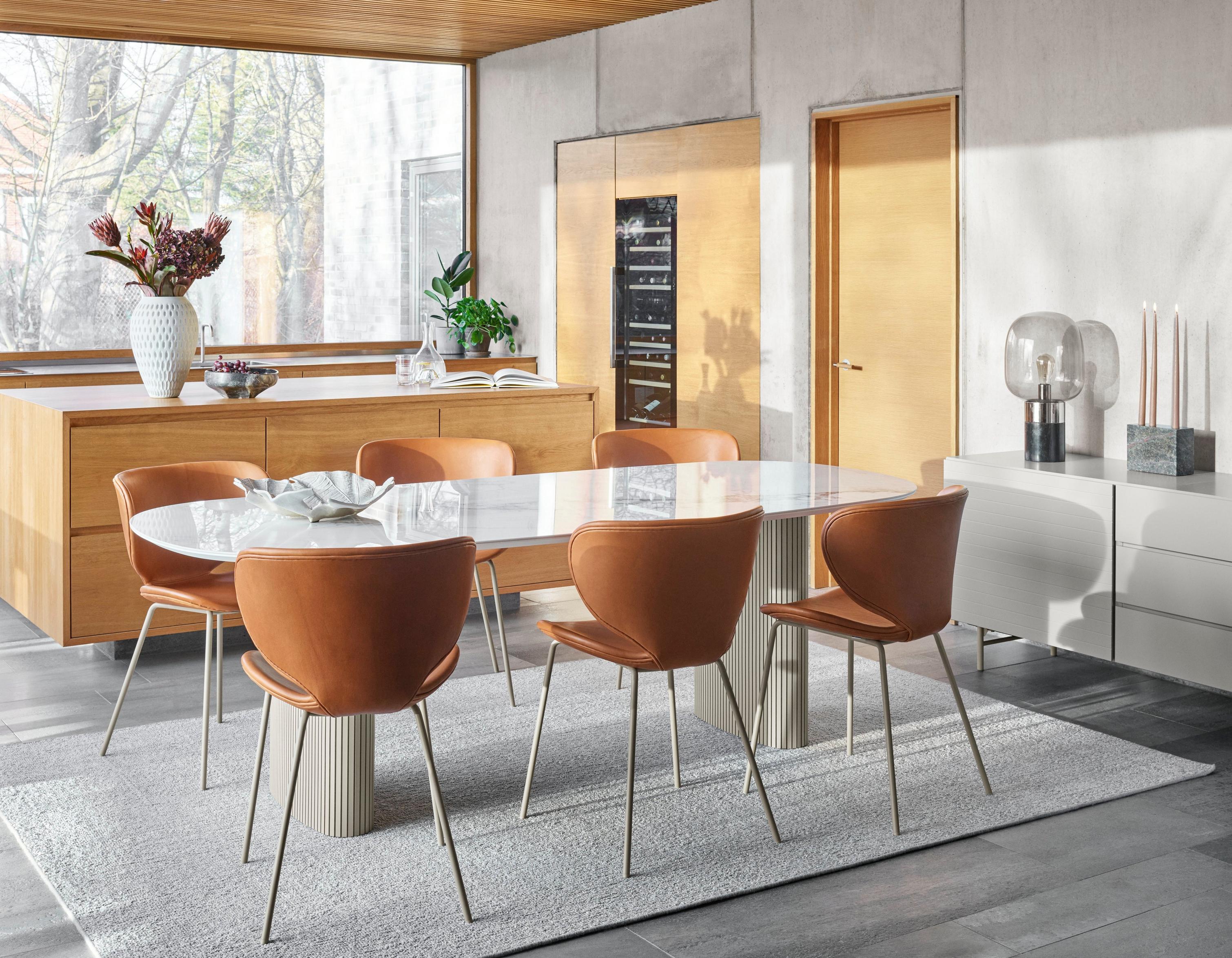 Warm and inviting dining room featuring the Santiago dining table