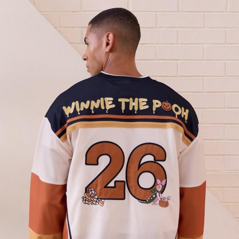 Back view of model wearing Winnie the Pooh jersey with number 26 and character graphics. Shop Now.