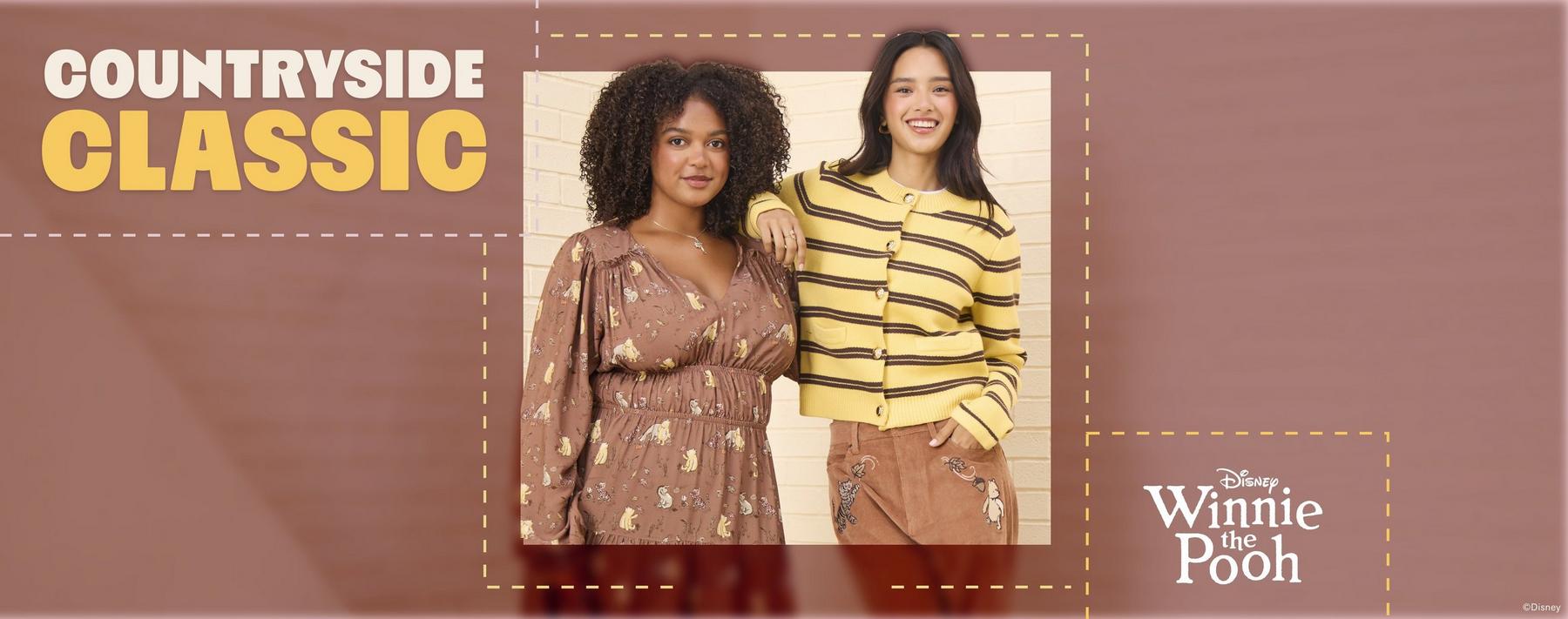 Two models wearing Disney Winnie the Pooh dress and striped cardigan with Pooh pants. Shop Now.