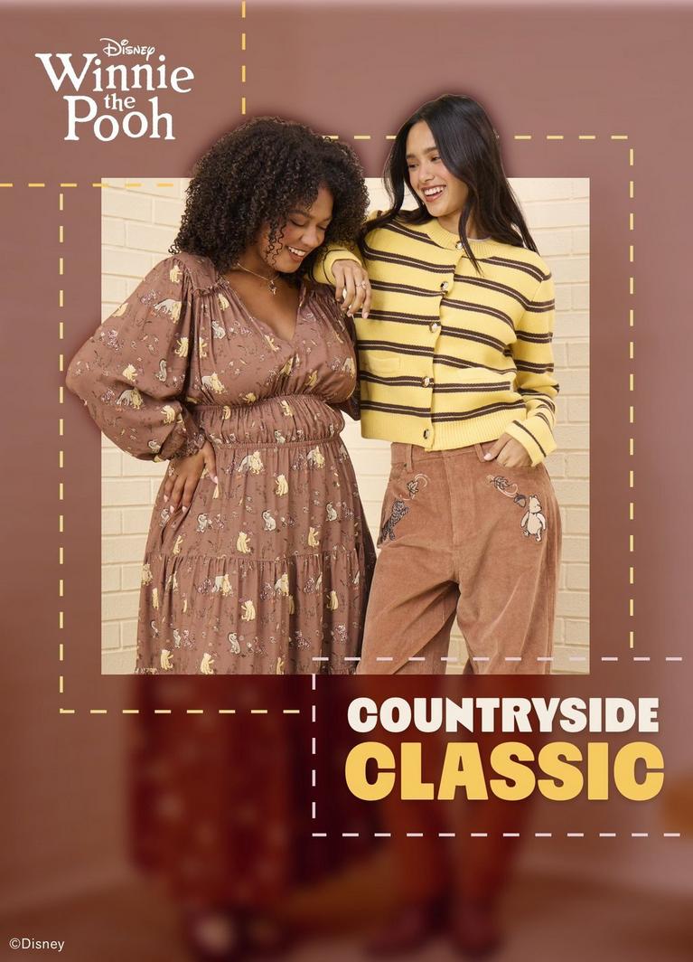 Two models wearing Disney Winnie the Pooh dress and striped cardigan with Pooh pants. Shop Now.