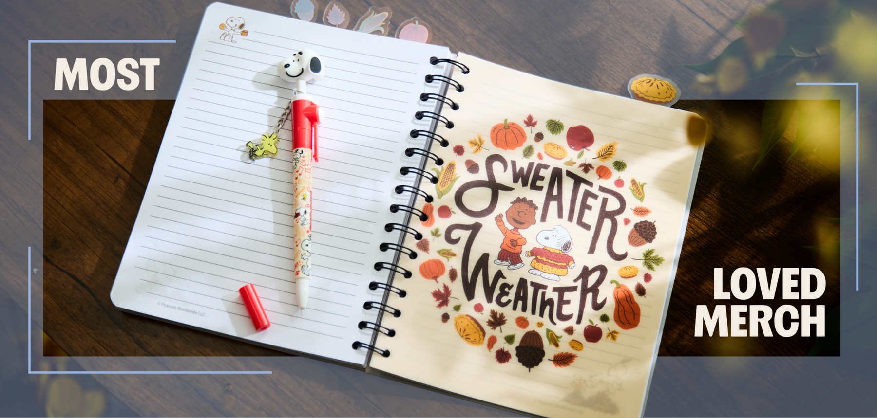 Peanuts spiral notebook with Snoopy pen and “Sweater Weather” autumn design on page. Shop Now.