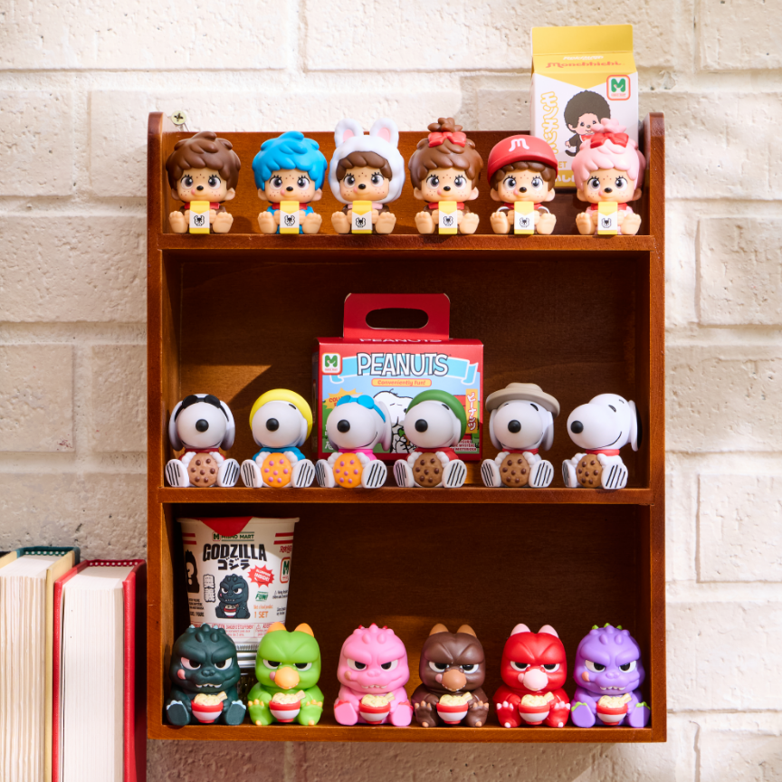 Wooden shelf with mini figurine collections lined up; Monchhichi, Peanuts and Godzilla. Shop Now.