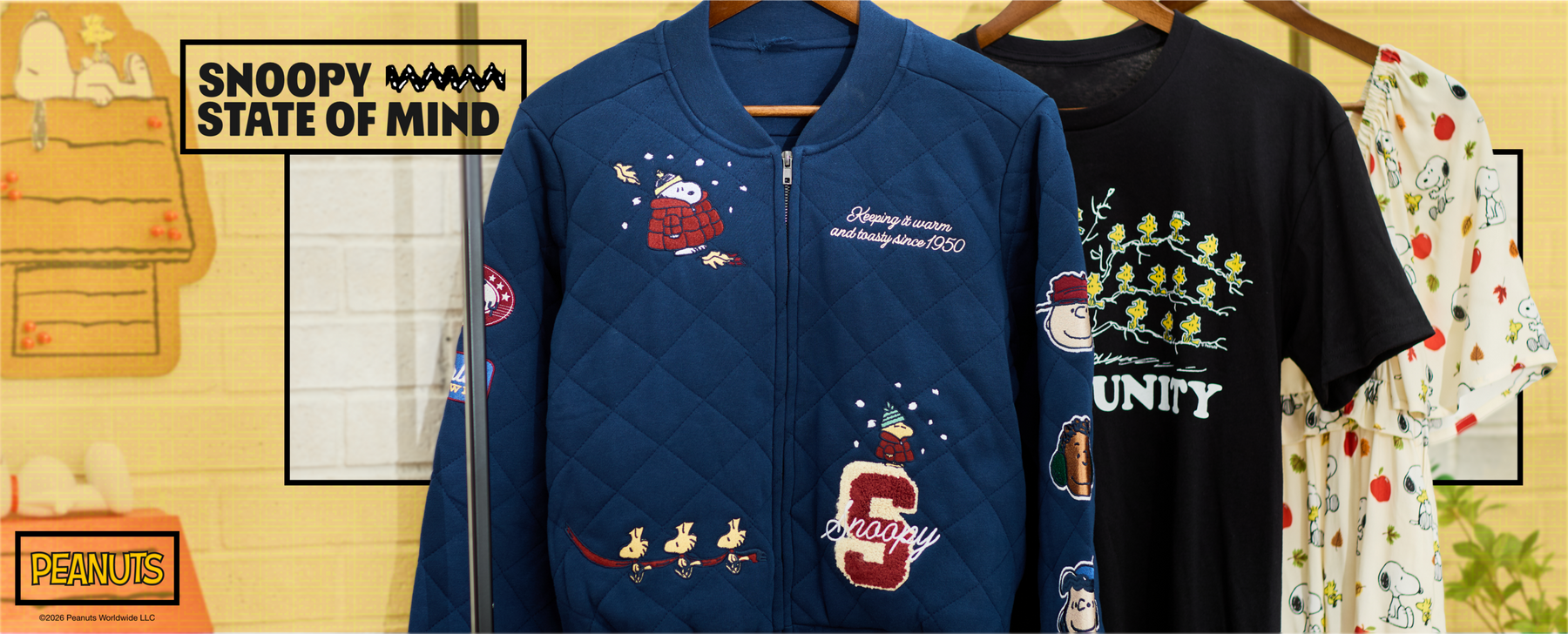 Peanuts apparel on hangers: quilted Snoopy jacket, black graphic T-shirt, and Snoopy print dress. Shop Now.
