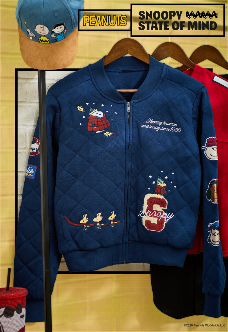 Peanuts apparel on hangers: quilted Snoopy jacket, black graphic T-shirt, and Snoopy print dress. Shop Now.