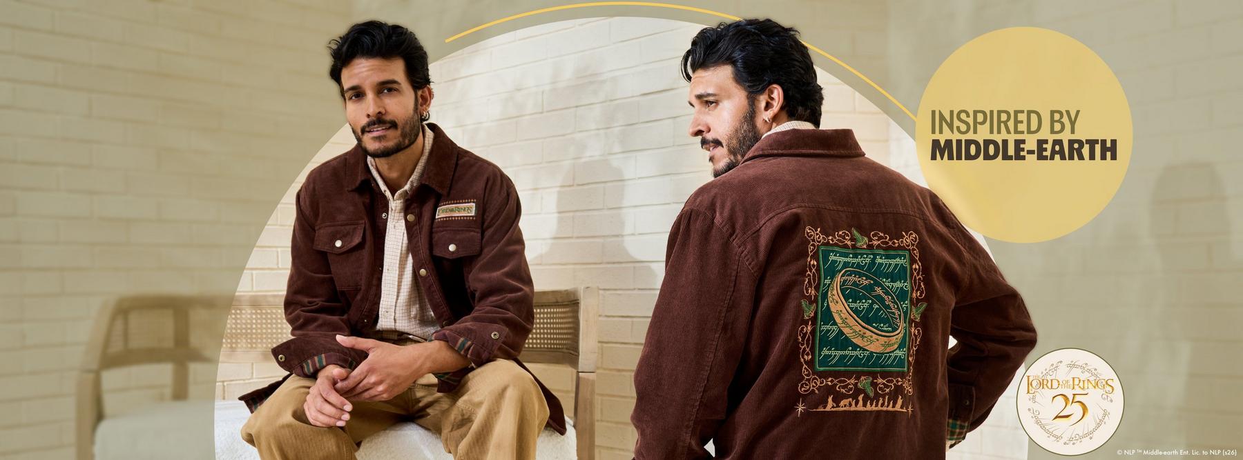 Man wearing brown jacket with embroidered Lord of the Rings ring design on back. Shop Now.