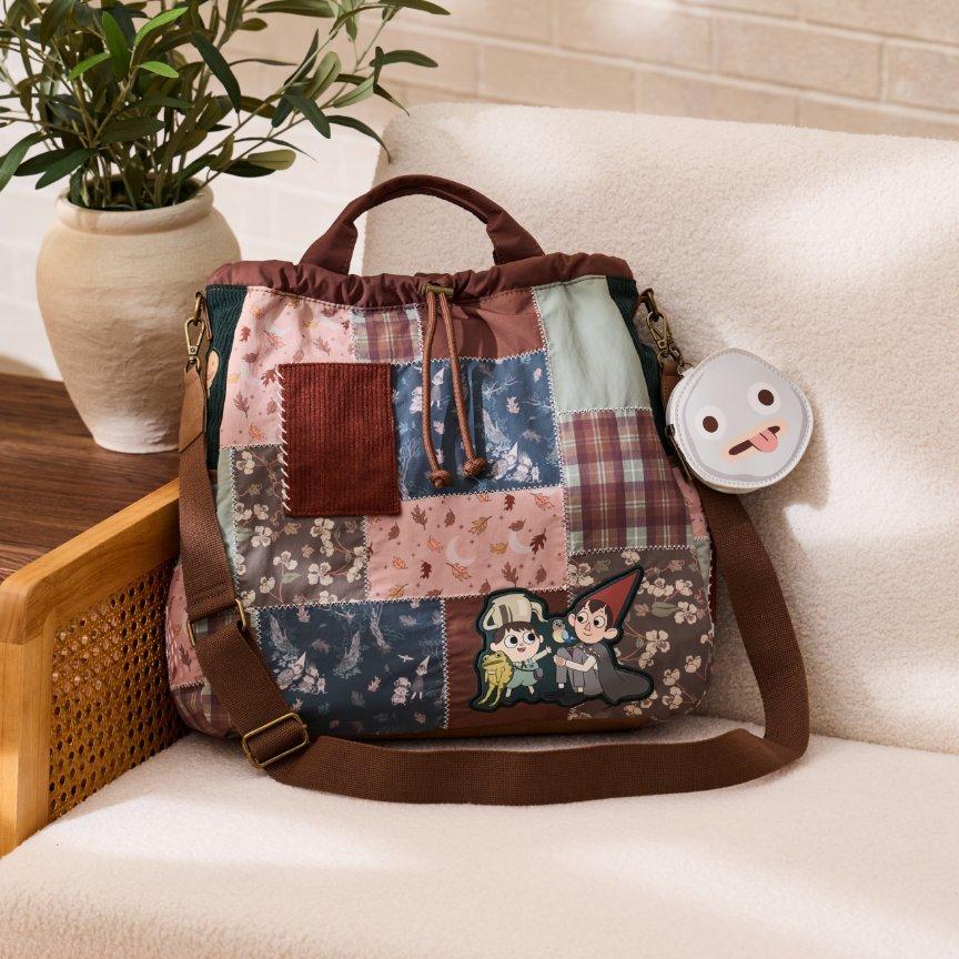 Patchwork shoulder bag with cartoon characters print of Over the Garden Wall and round face pouch charm. Shop Now.