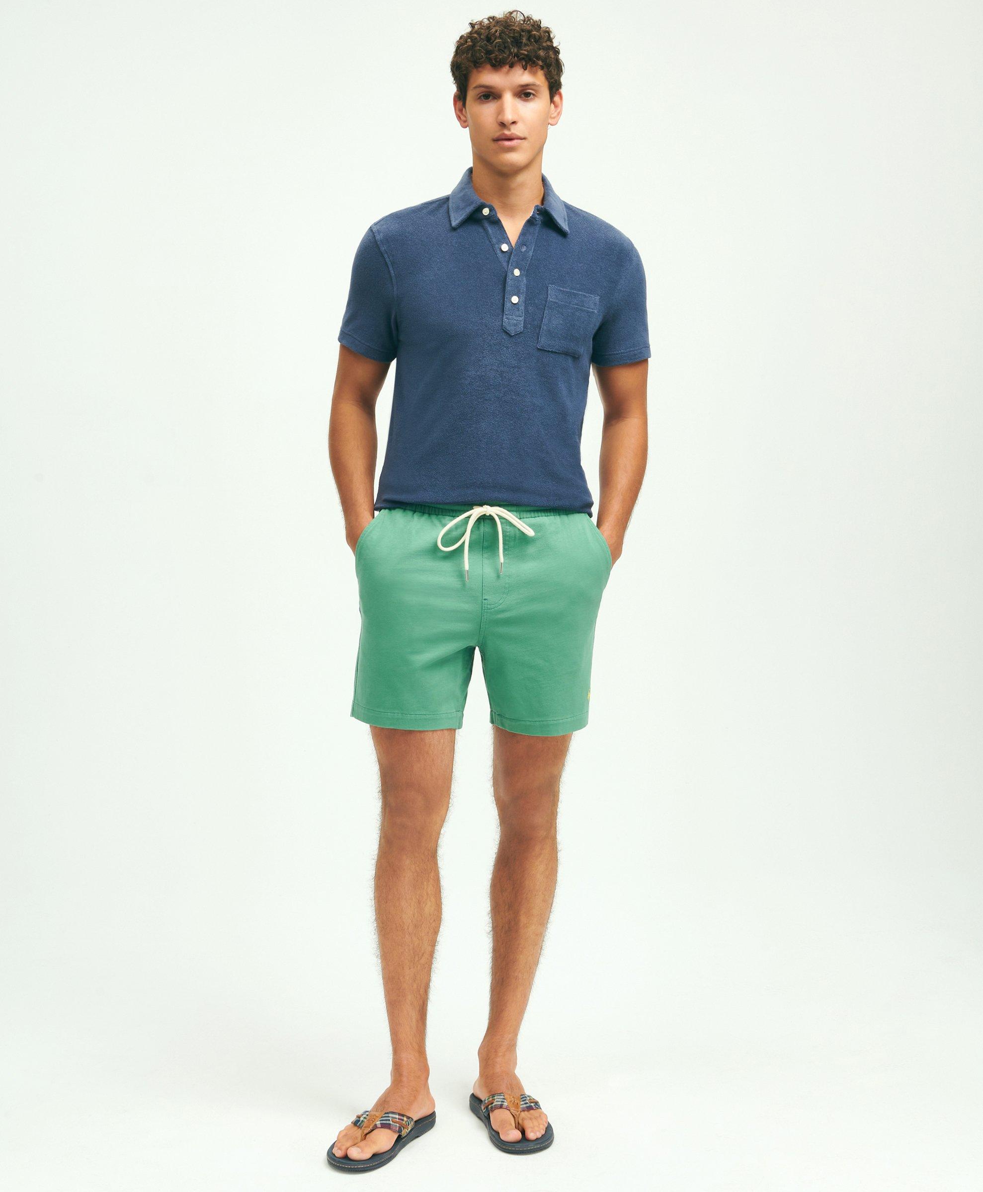 Green shorts hot sale blue shirt