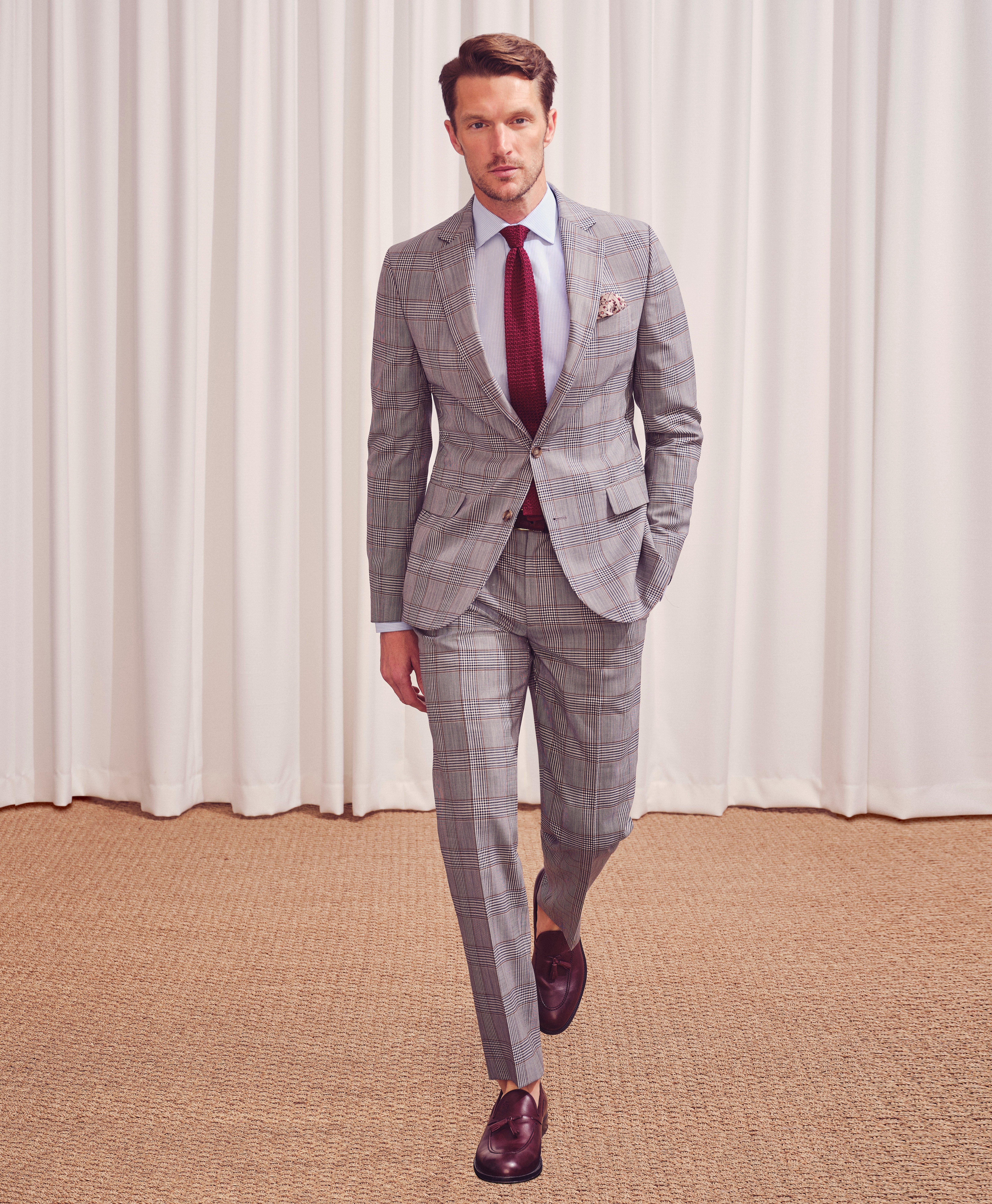 black suit and grey pants