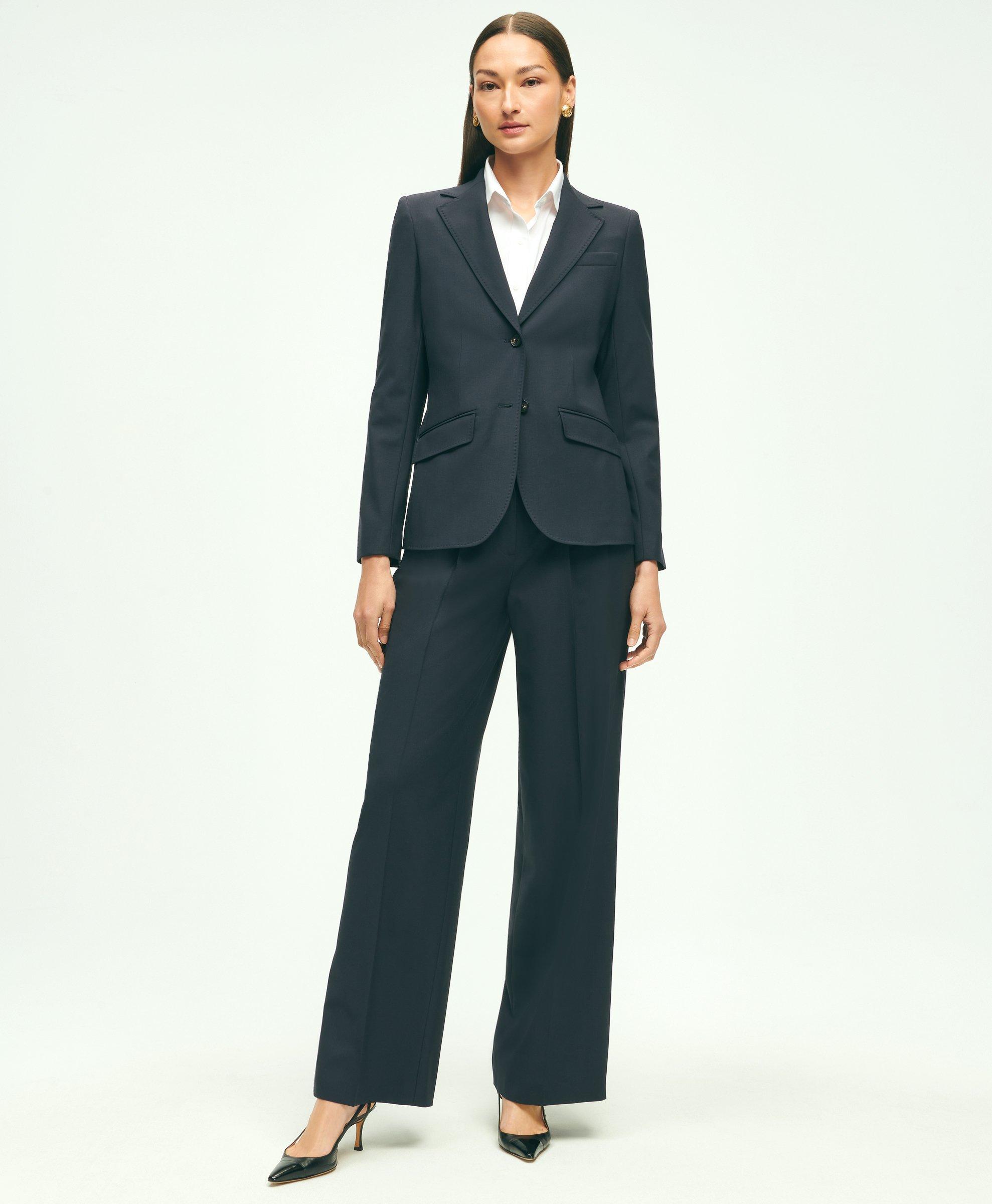 Suit. Women trouser suit. Trousers with pleats on the front and back, –