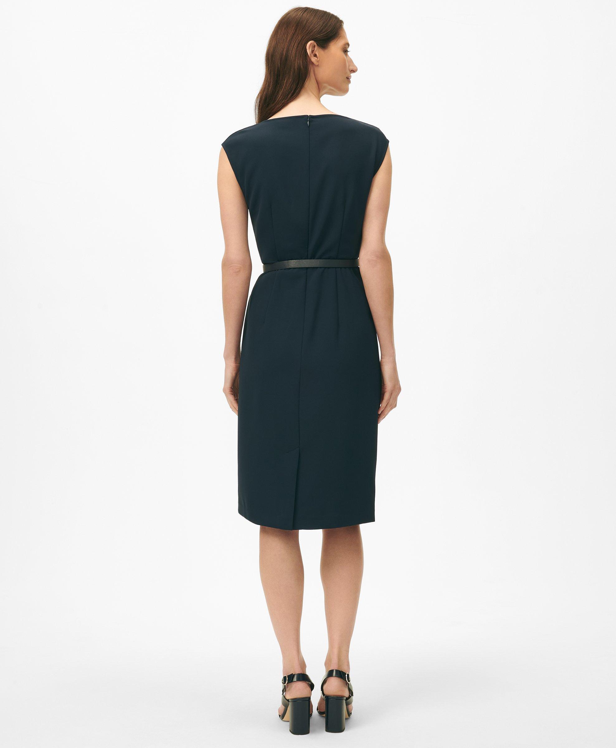 Stretchy fabric makes offers this body contouring black shift dress with a cowl necklin