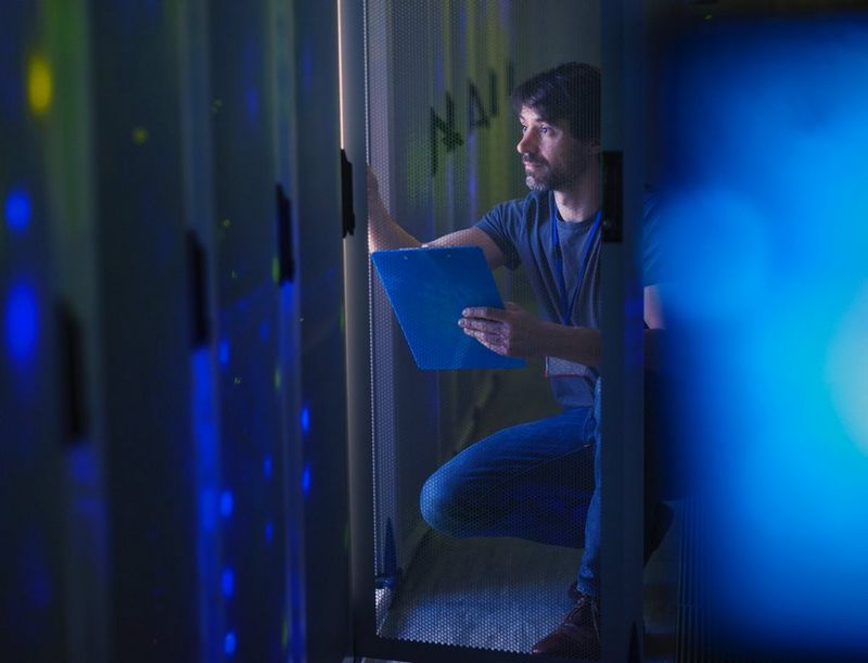 Print service providers reviewing work on screen