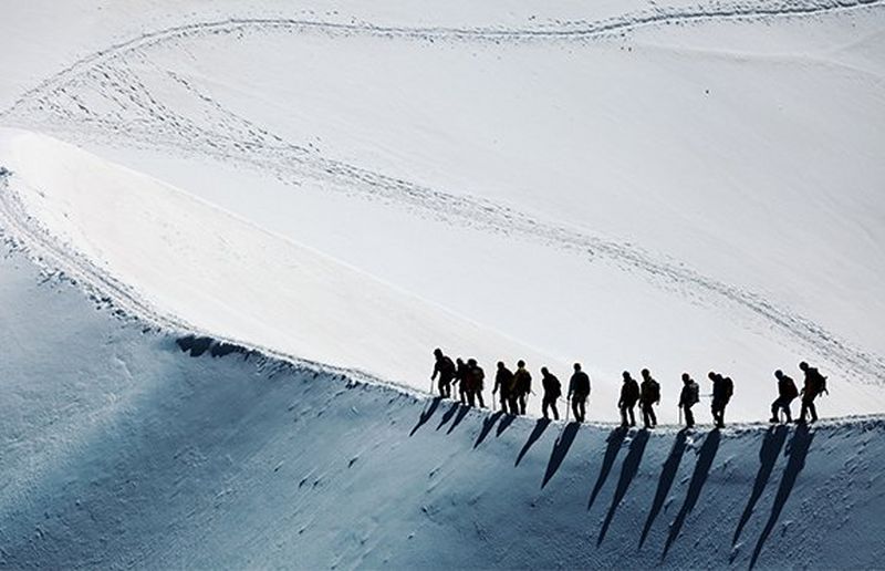 Group of people on a hike in the snow