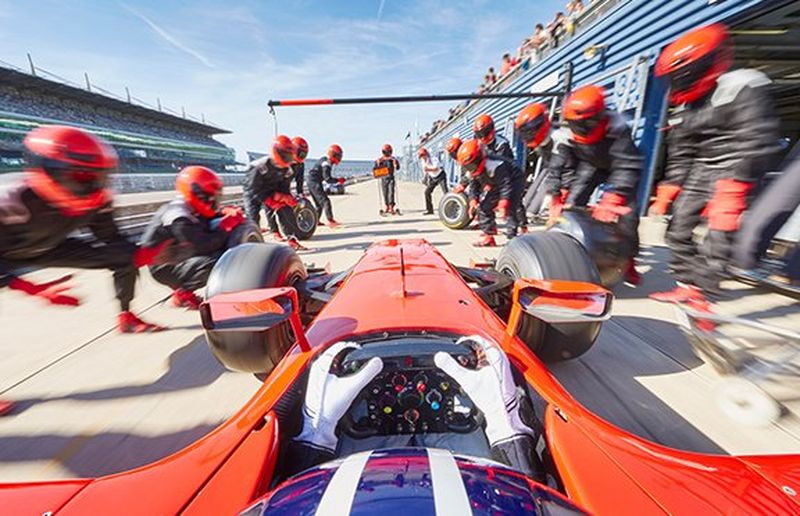 Race car having a pit stop check