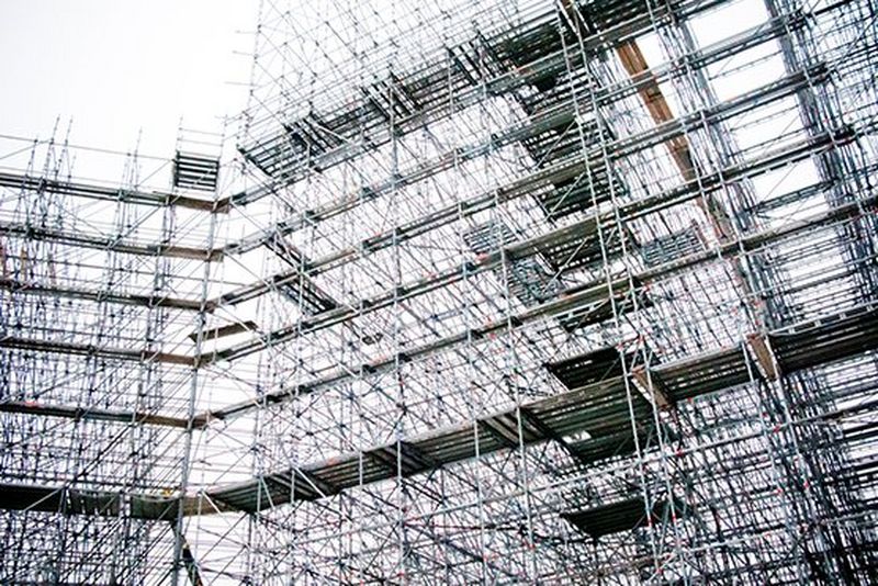 Scaffolding against a grey sky